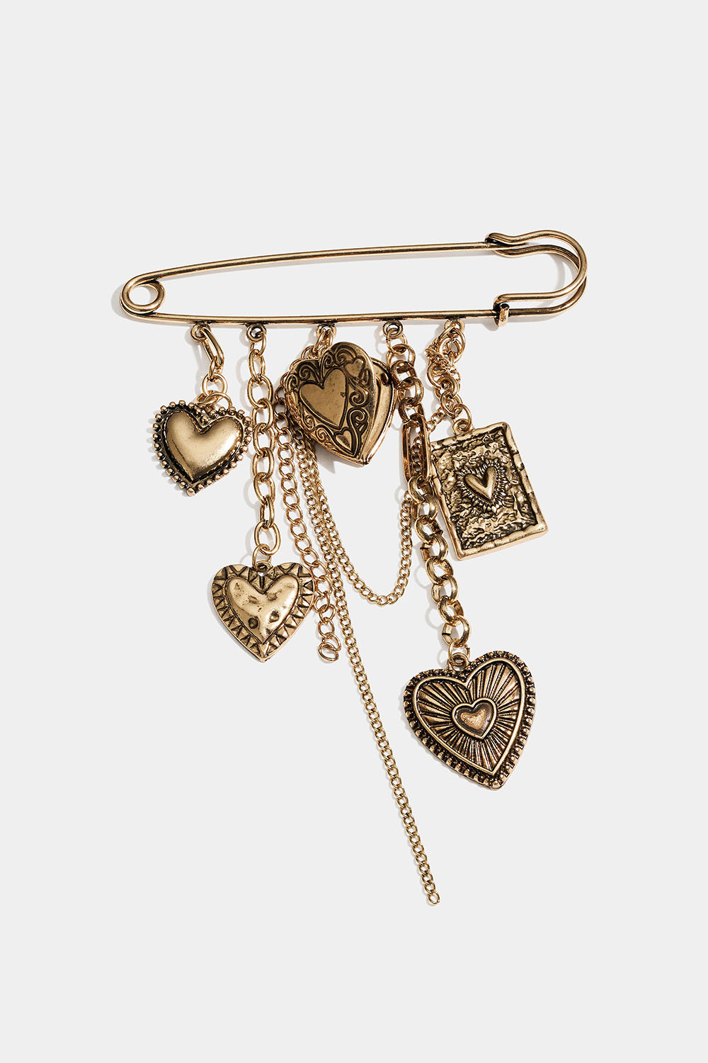 Brosje med sikkerhetsnål med hjerte