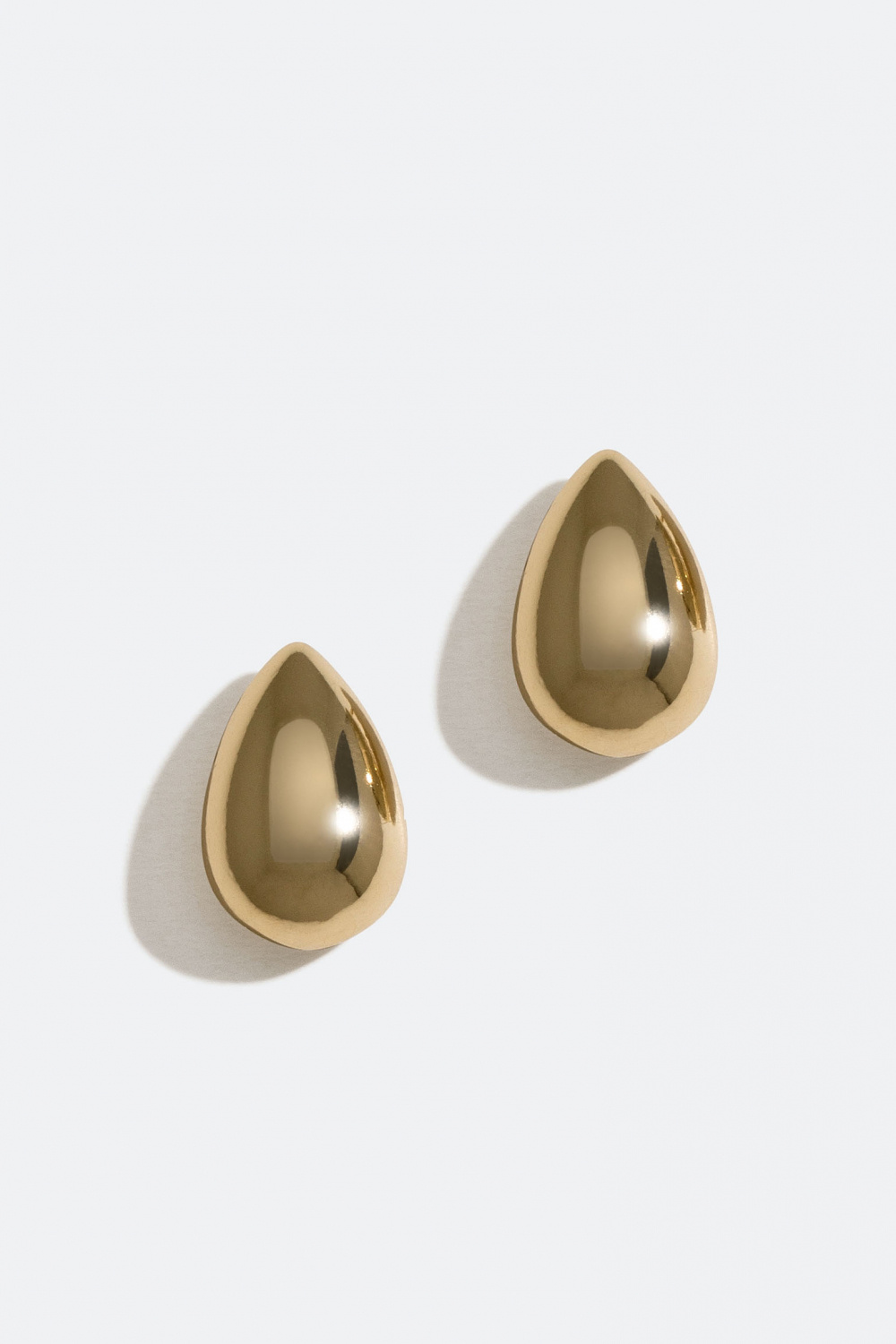 Gullfargede, dråpeformede studs