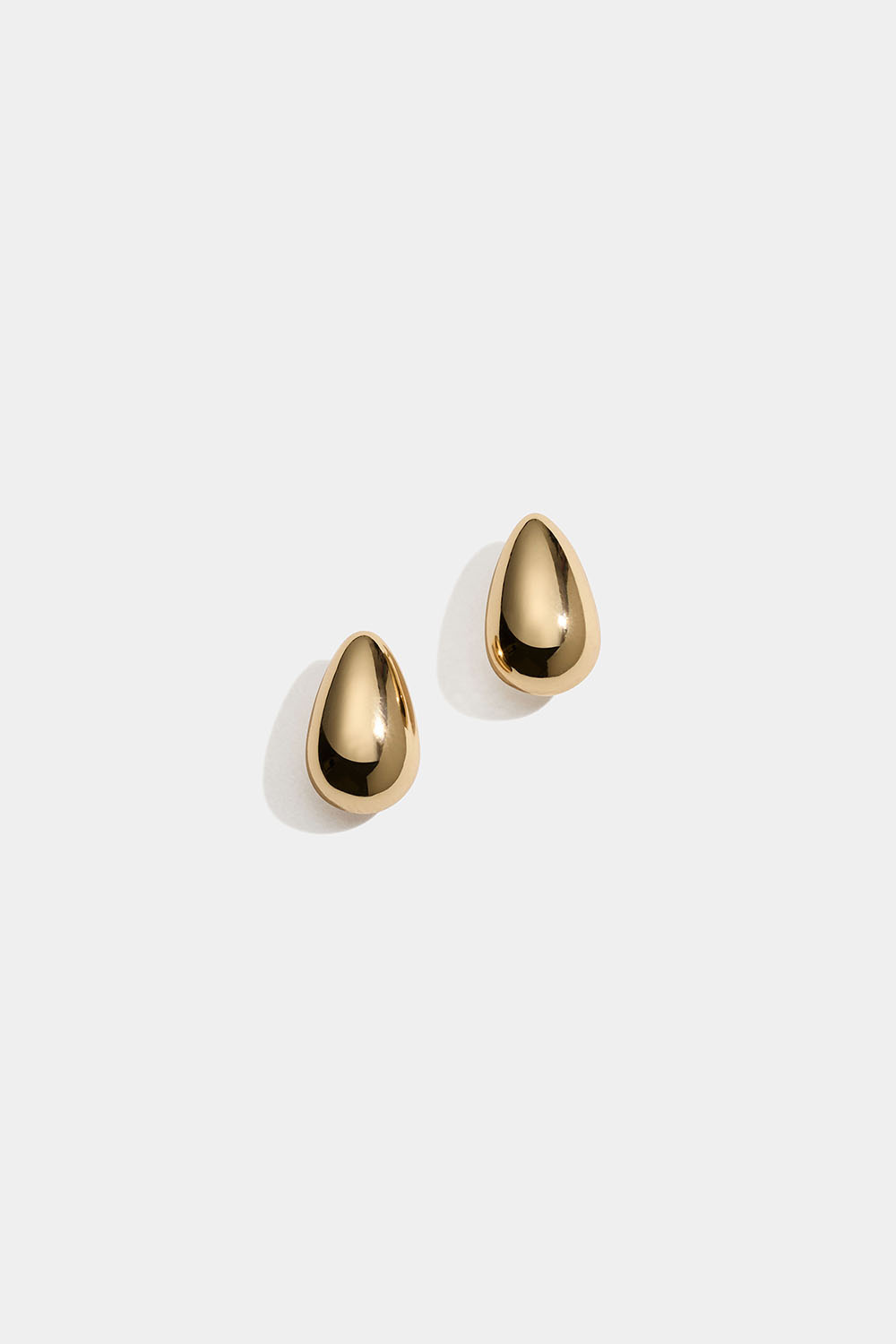 Gullfargede, dråpeformede studs
