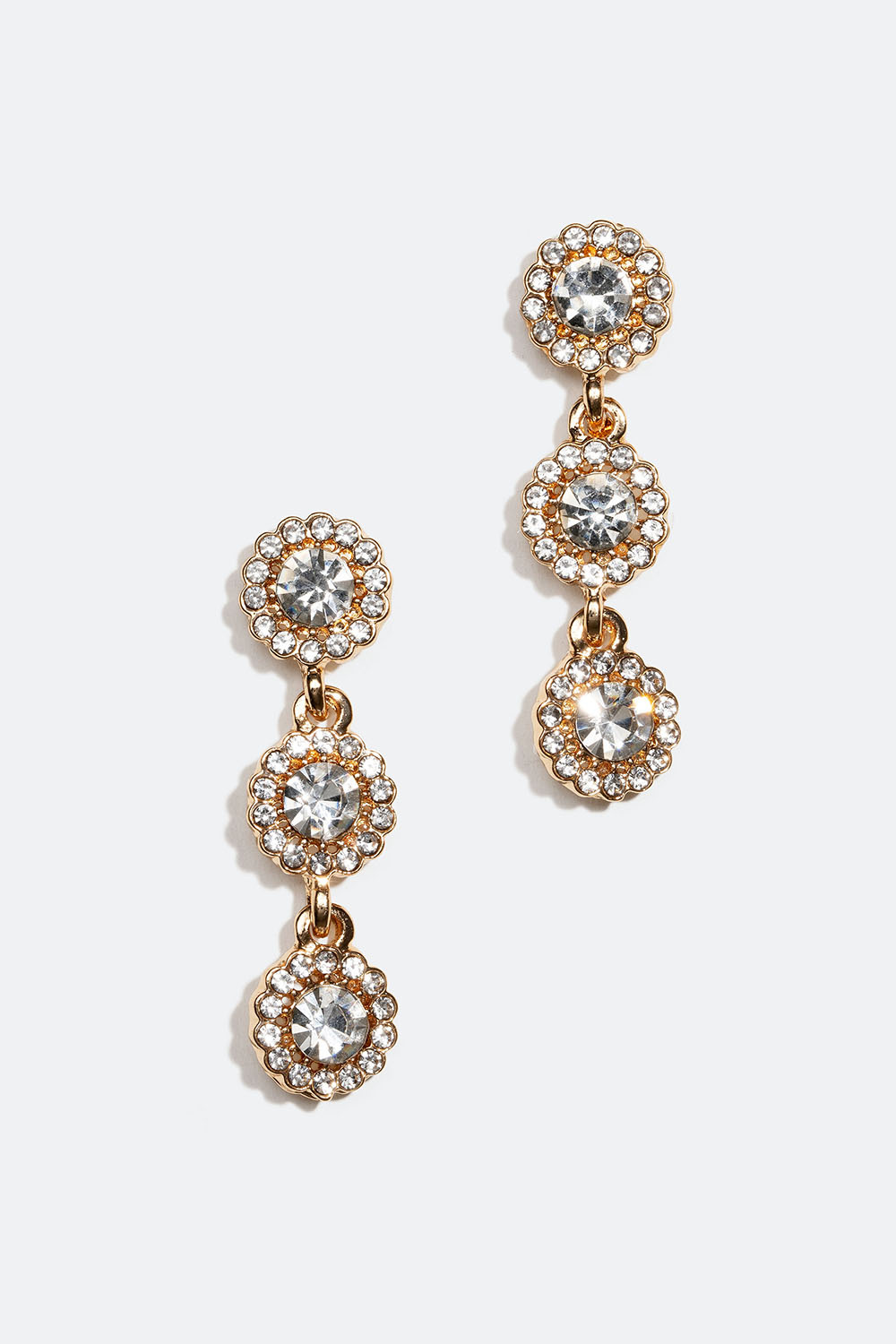 Gullfargede strassøredobber med tre runde glasstener