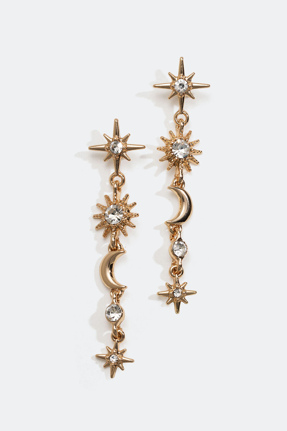 Gullfargede øredobber med stjerne- og måneanheng