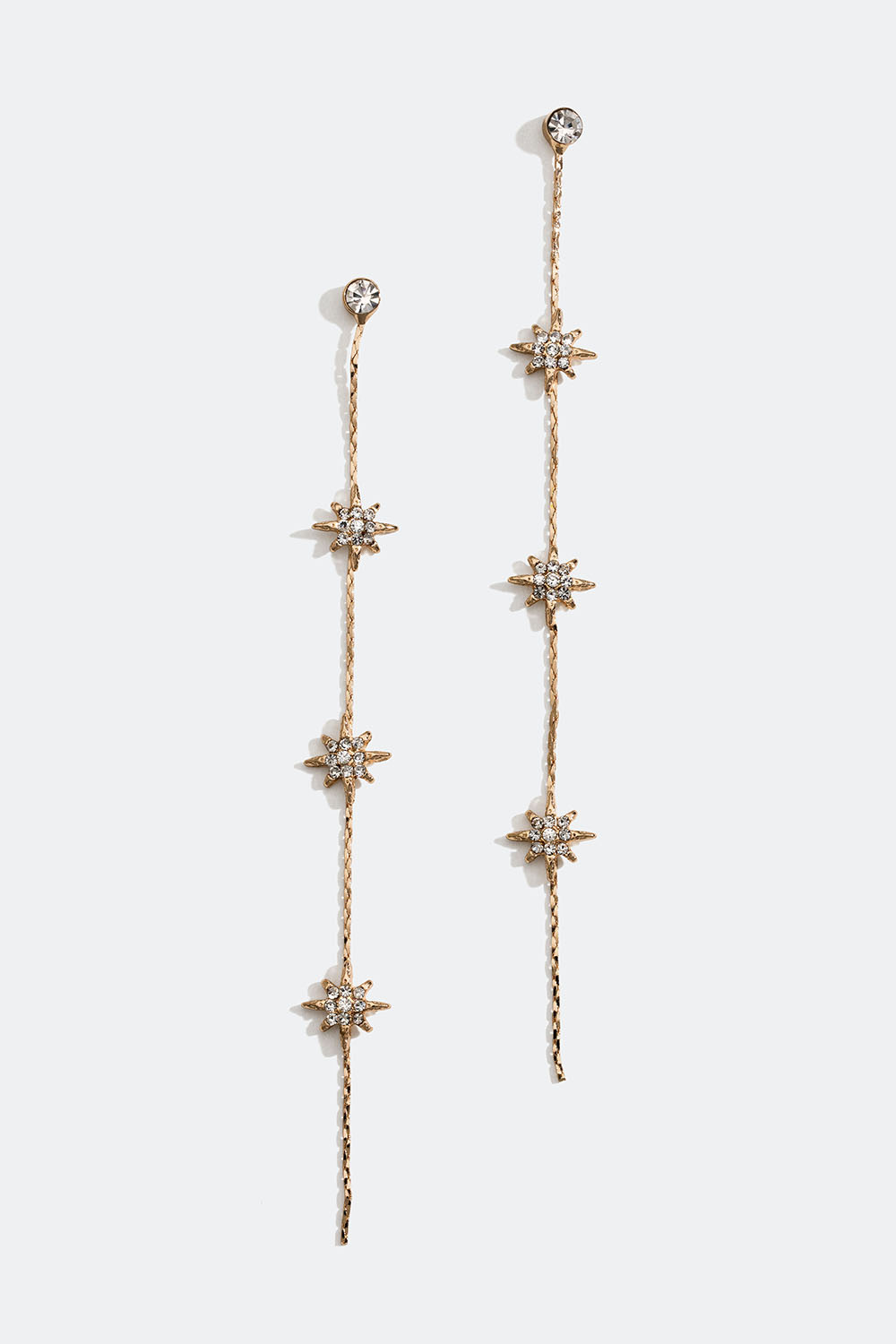 Lange gullfargede lenkeøredobber med stjerner og glassteiner