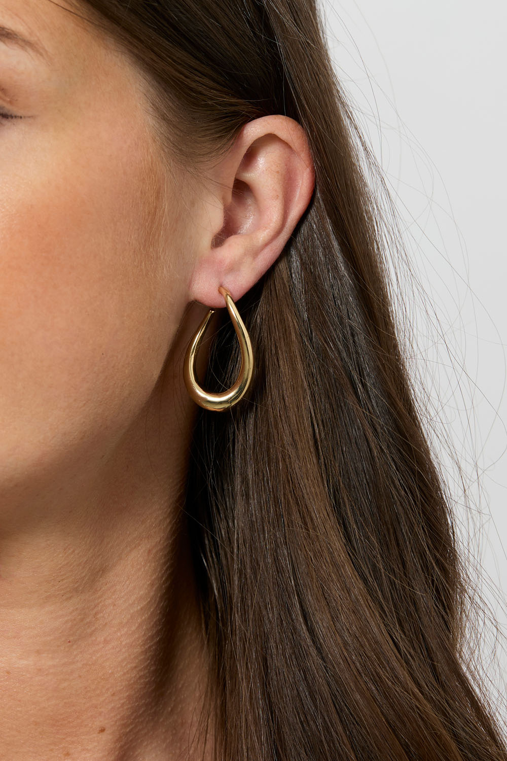 Gullfargede hoops med bølgeform