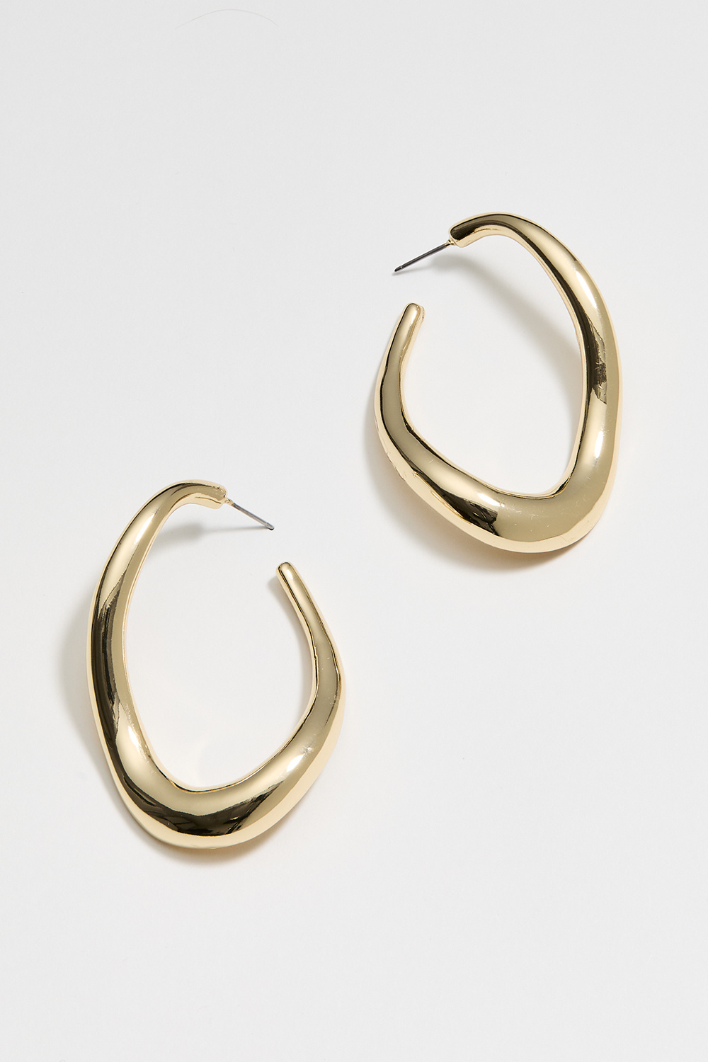 Store, gullfargede hoops med bølgeform