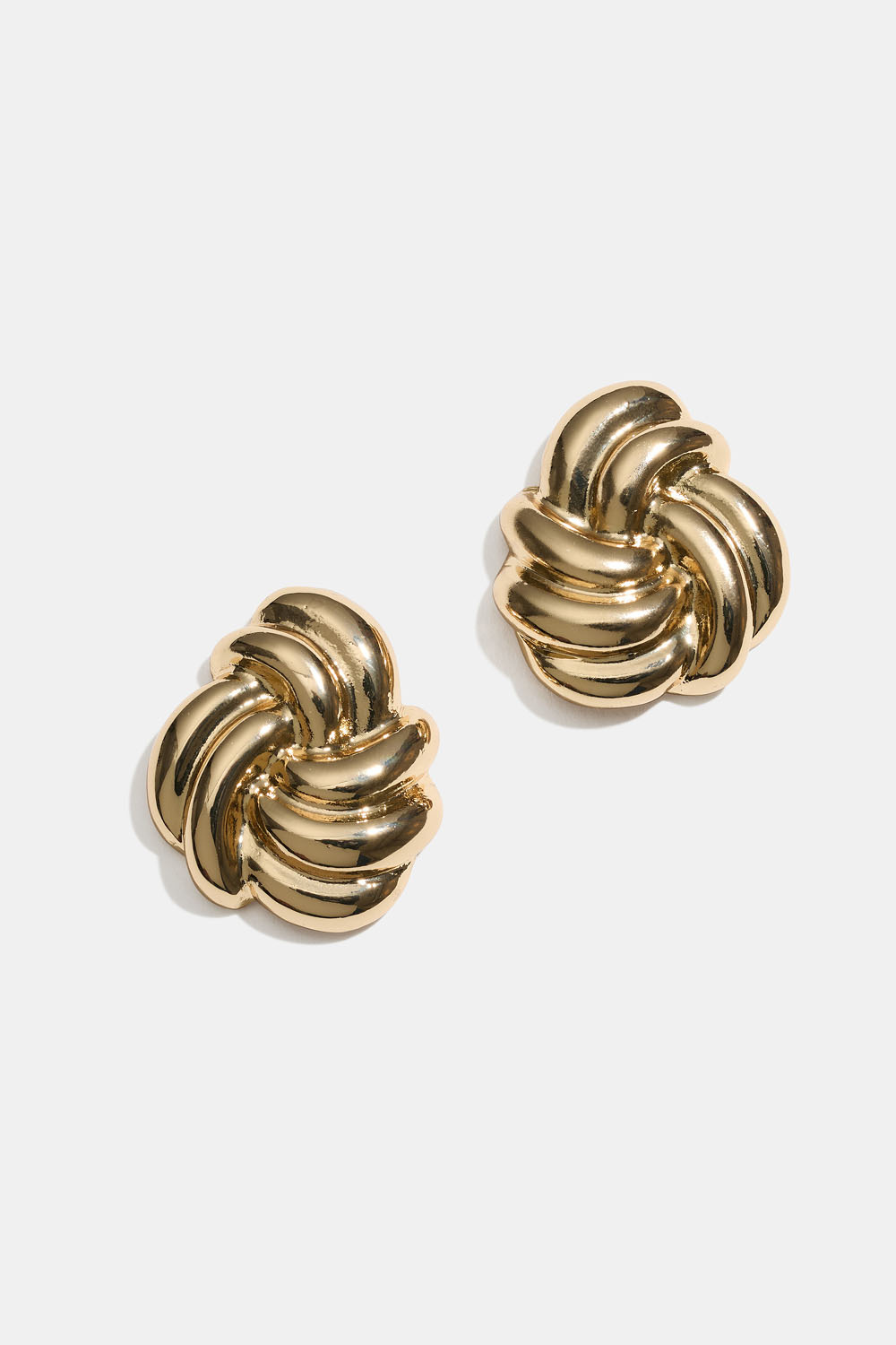 Store, gullfargede øredobber med knute