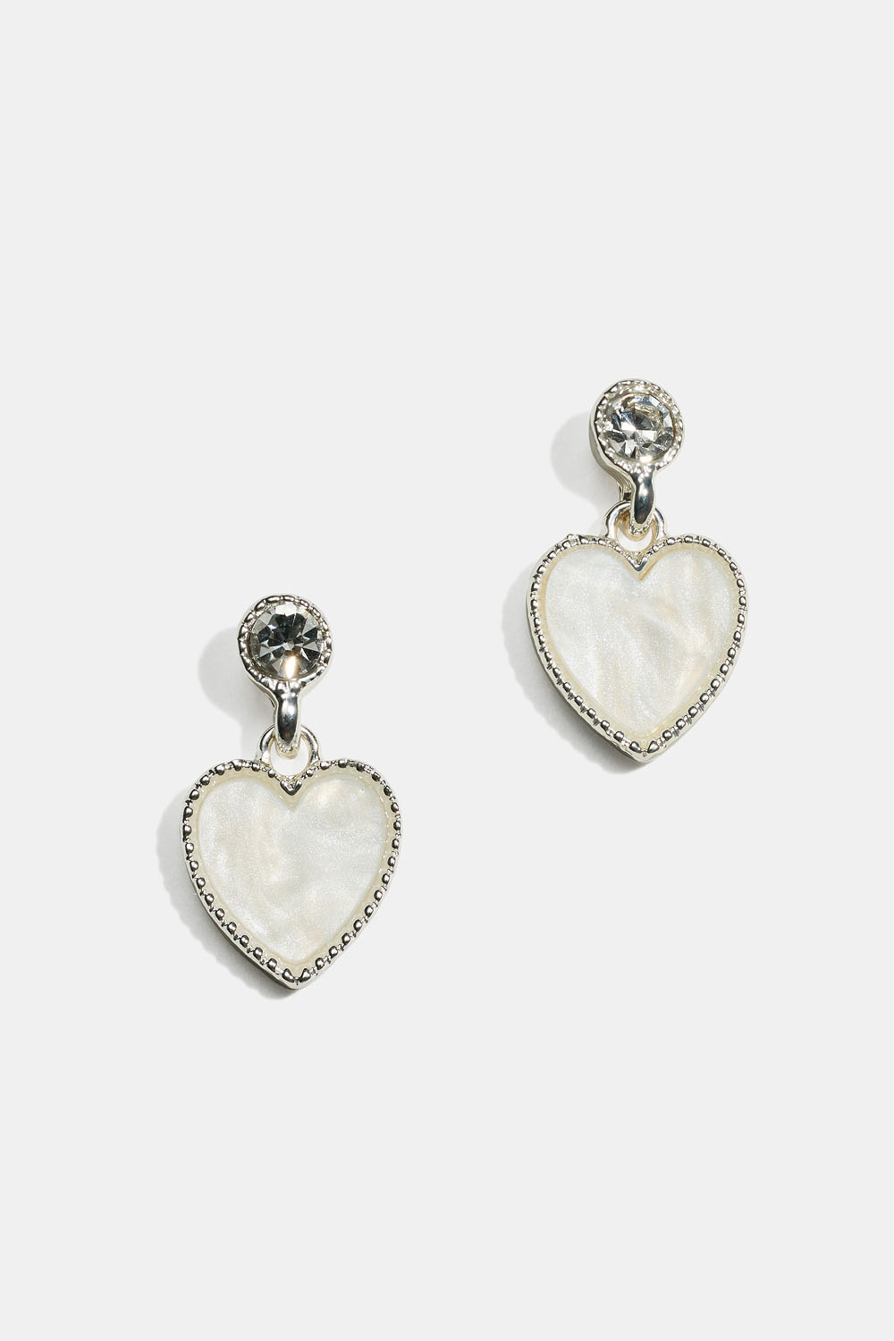 Øredobber med skimrende hjerter