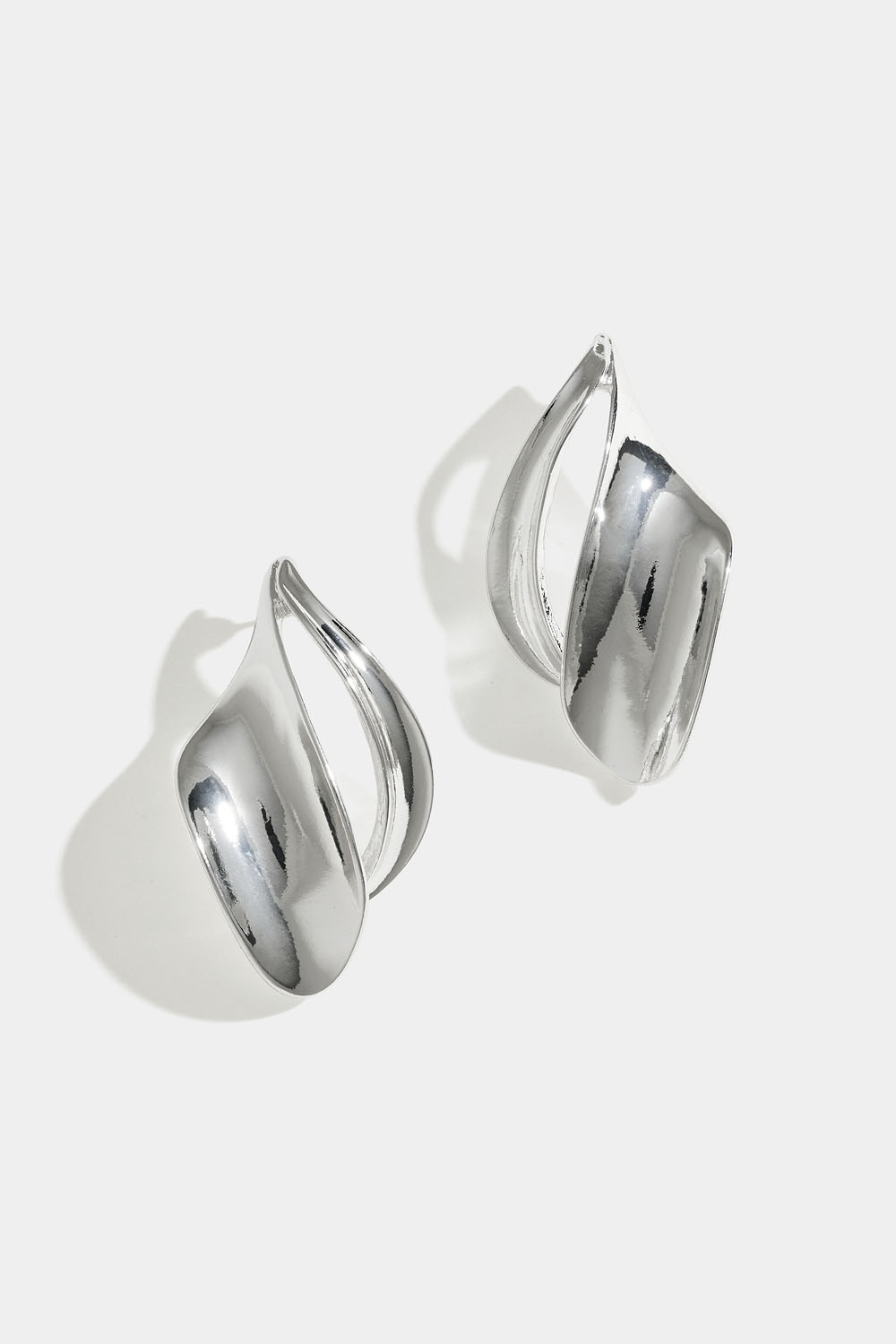 Diamantformede øredobber med avrundet design