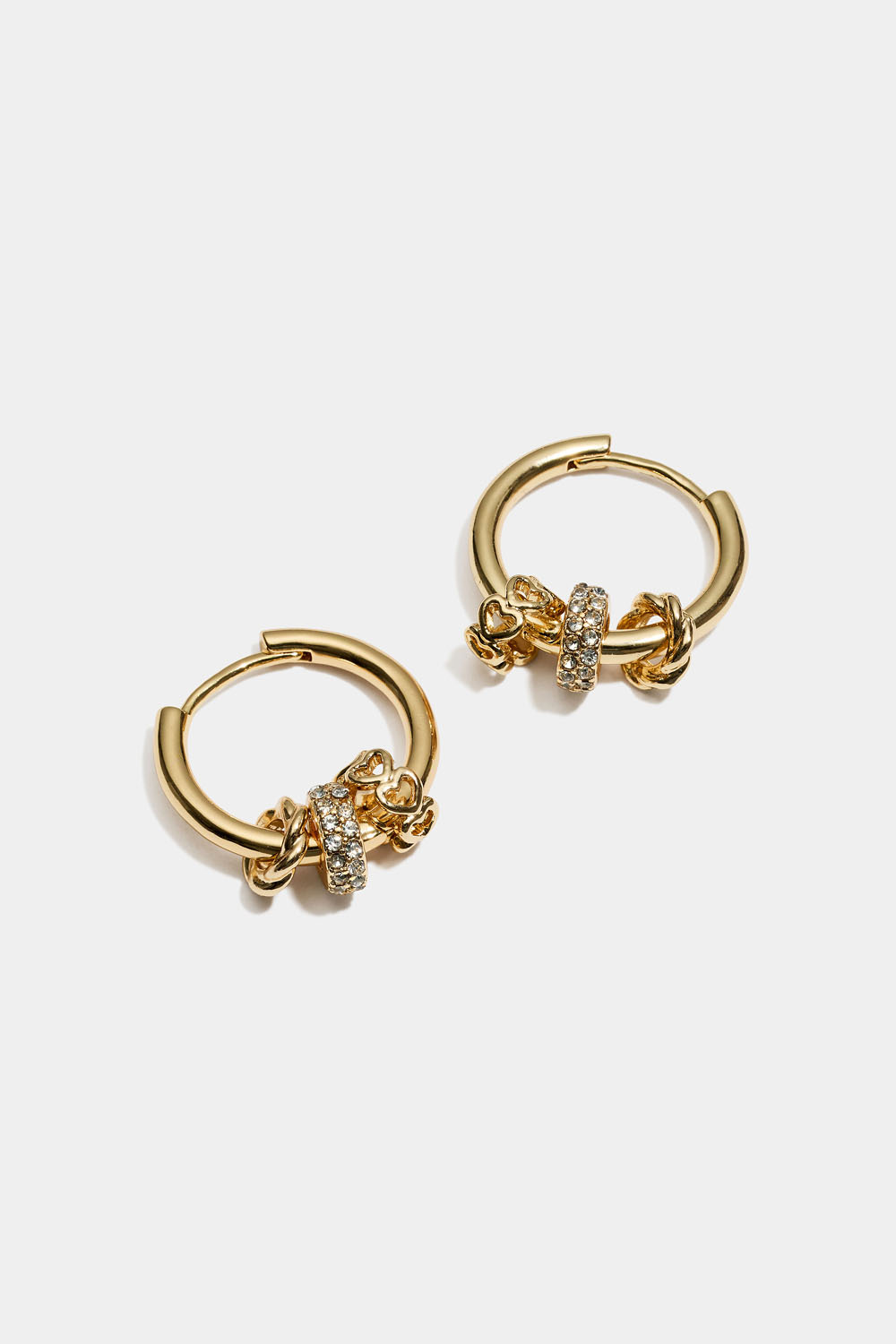 Gullfargede øreringer med runde charms