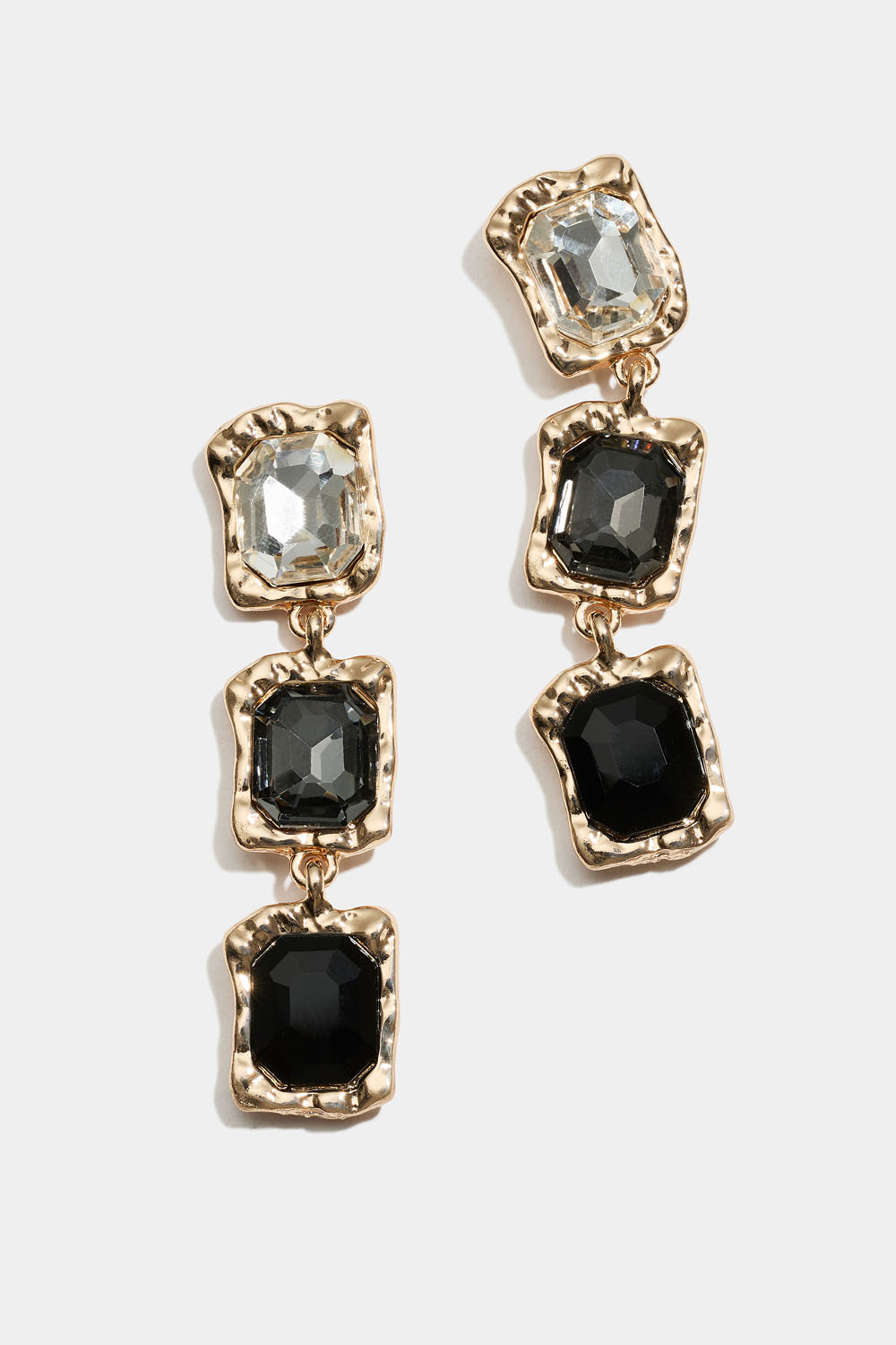 Øredobber med hvite, grå og svarte steiner