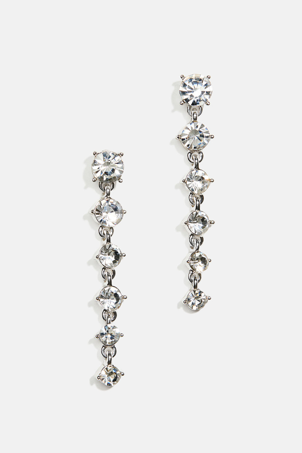 Øredobber med hvite runde glassteiner