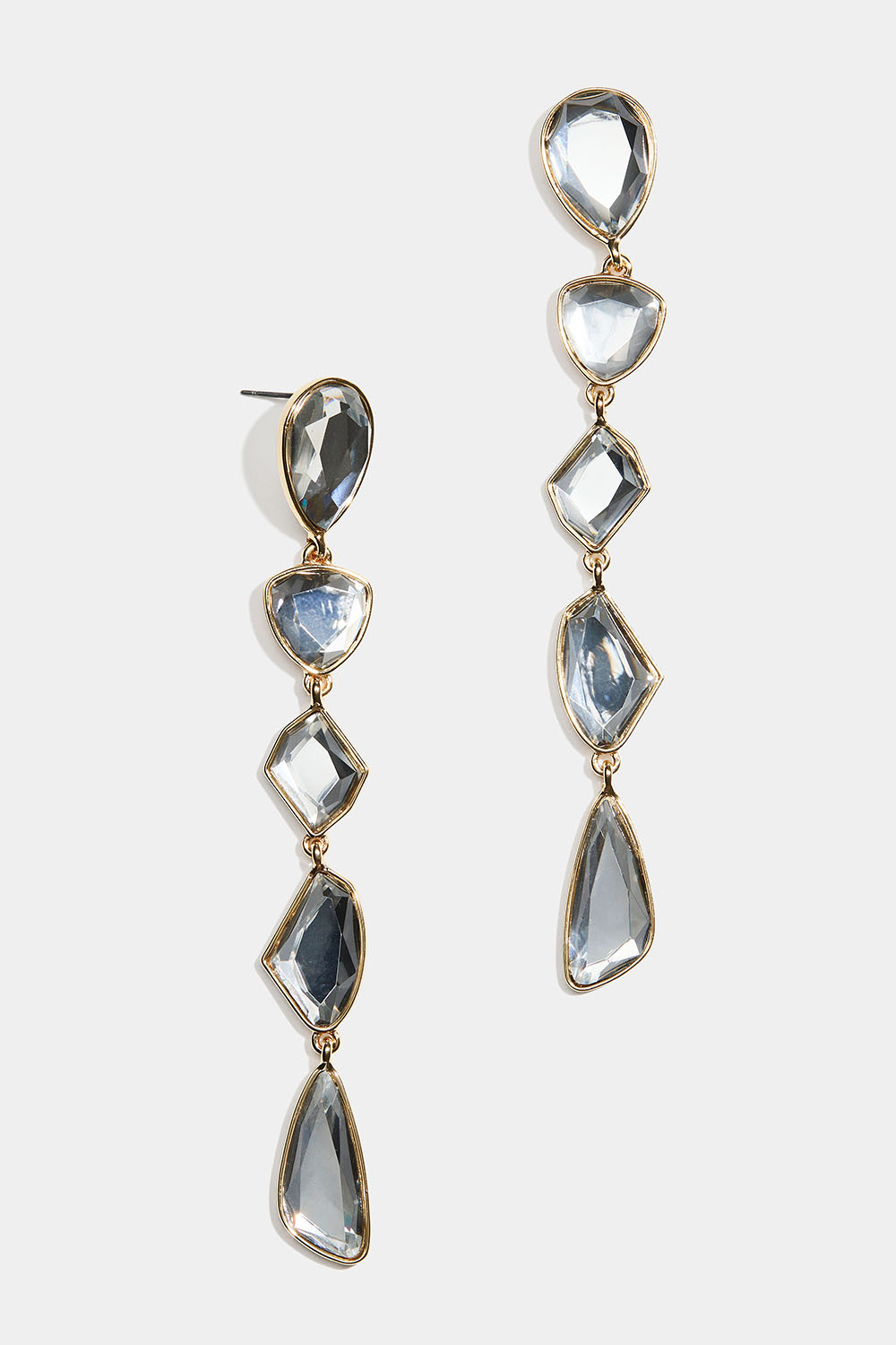 Lange øredobber med steiner i ulike former