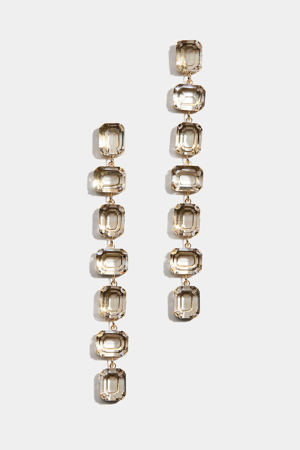 Øredobber med rektangulære hvite steiner