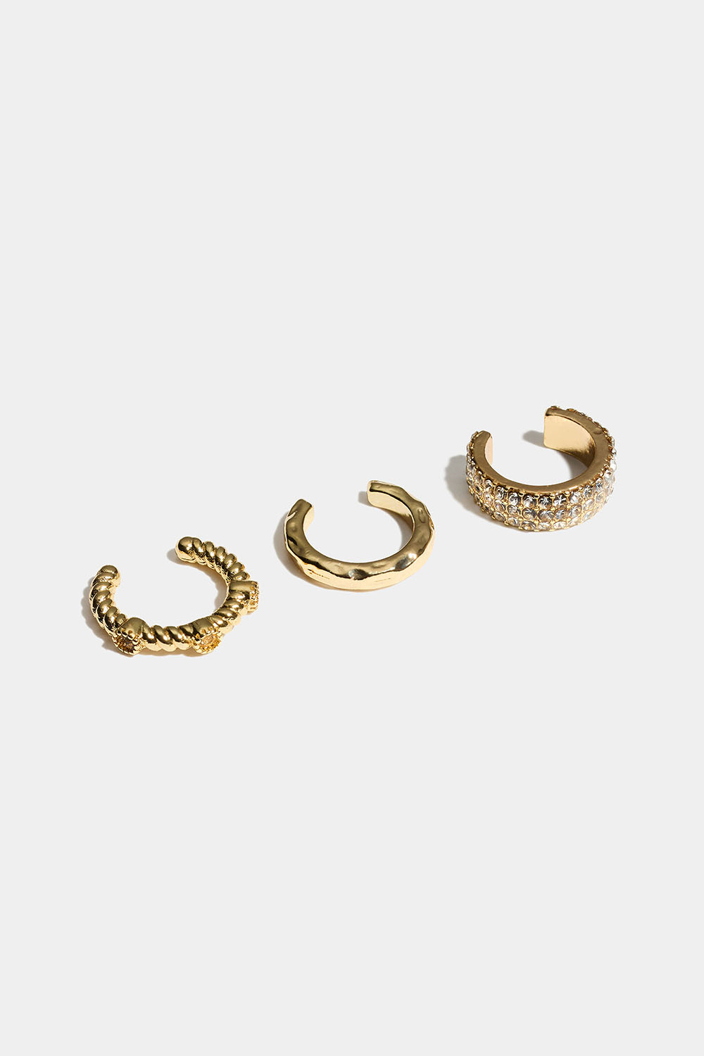 Gullfargede ear cuffs med struktur og glassteiner, 3-pakning