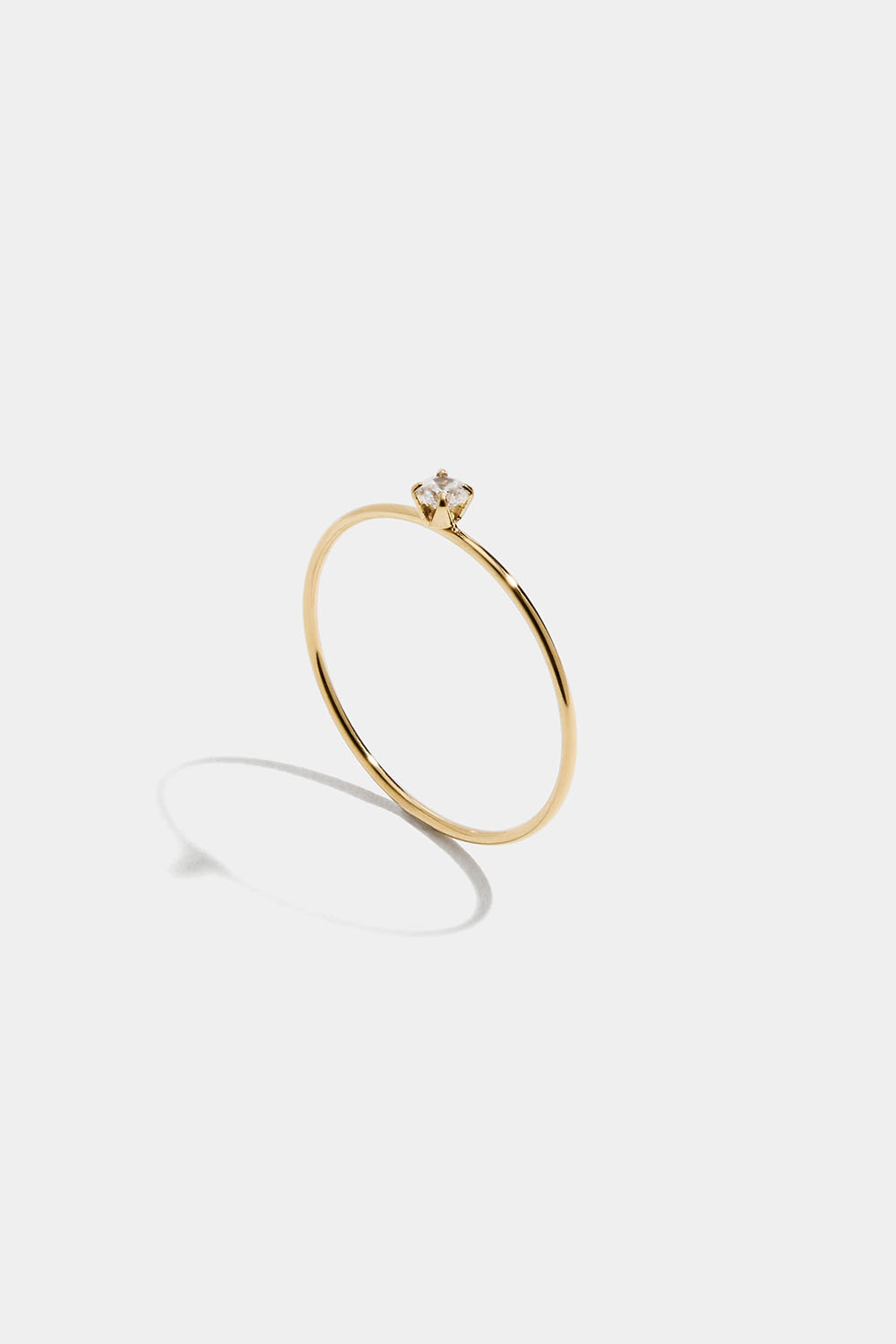 Tynn ring i stål med 18 karat gull og Cubic Zirconia