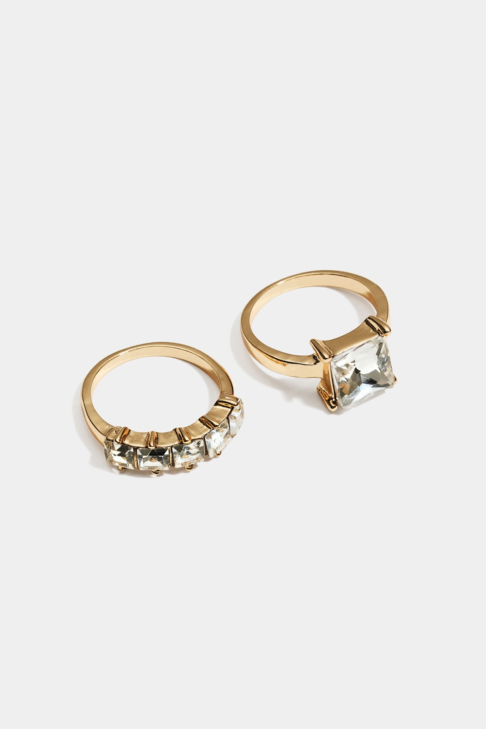 Gylne ringer med hvite steiner, 2-pakning