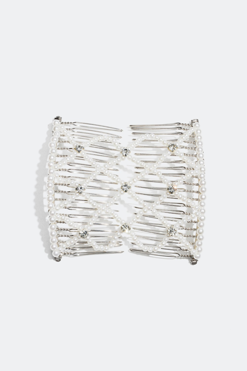 Dekorasjonskam med perler og glasstener