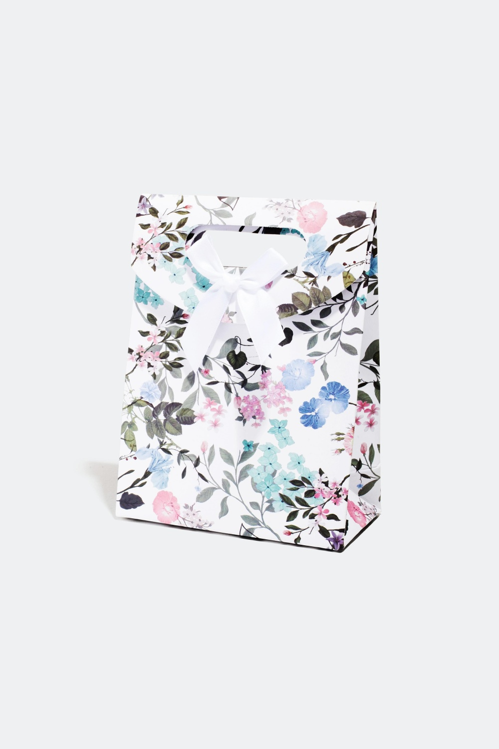 Blomstermønstret gavepose med sløyfe