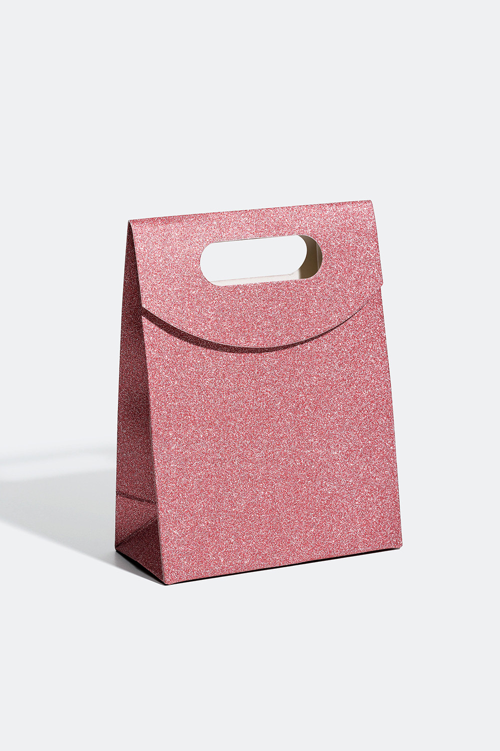 Gavepose som glitrer i forskjellige farger