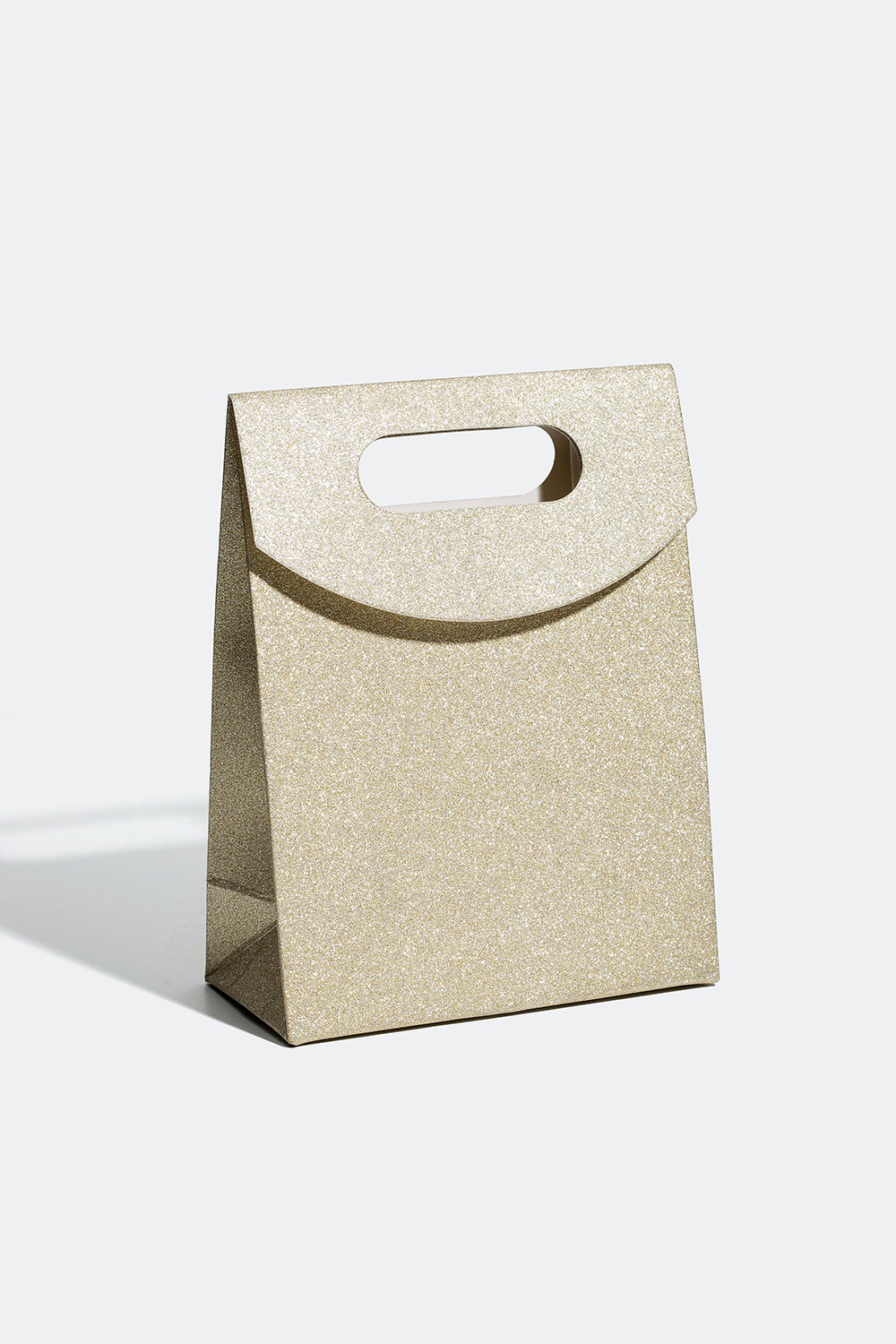 Gavepose som glitrer i forskjellige farger