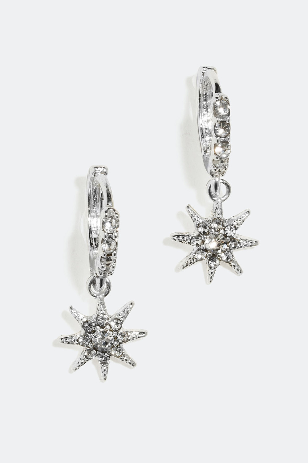 Øreringer med stjerneformede anheng og glassteiner