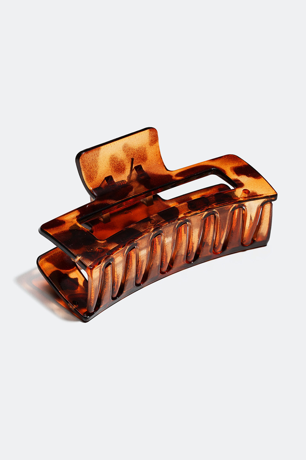 Brunmelert hårspenne