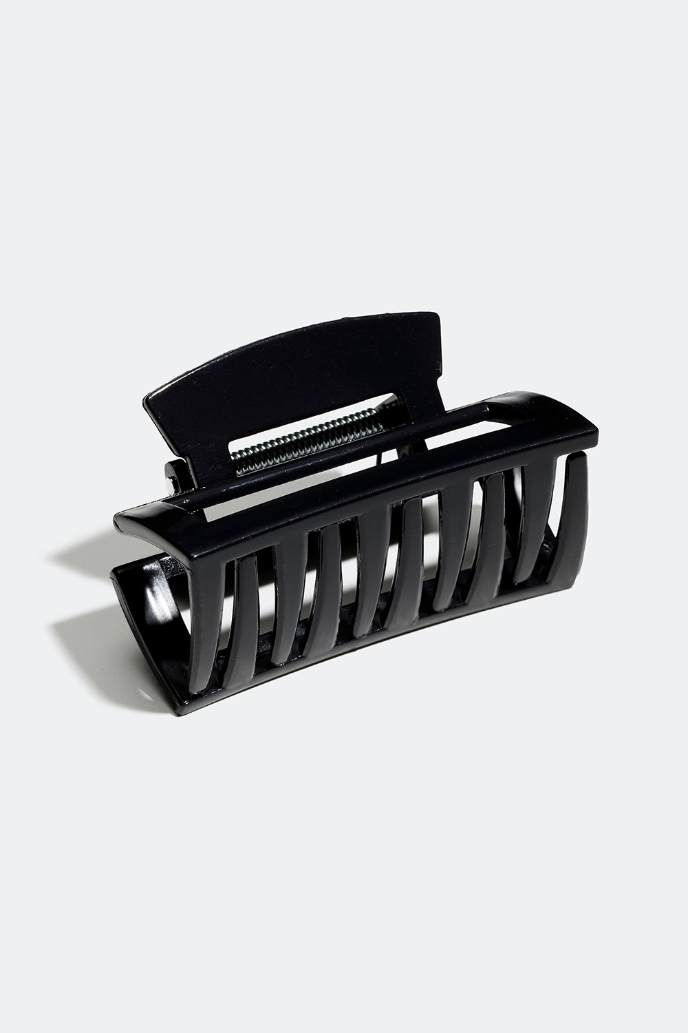 Svart rektangulær hårklemme