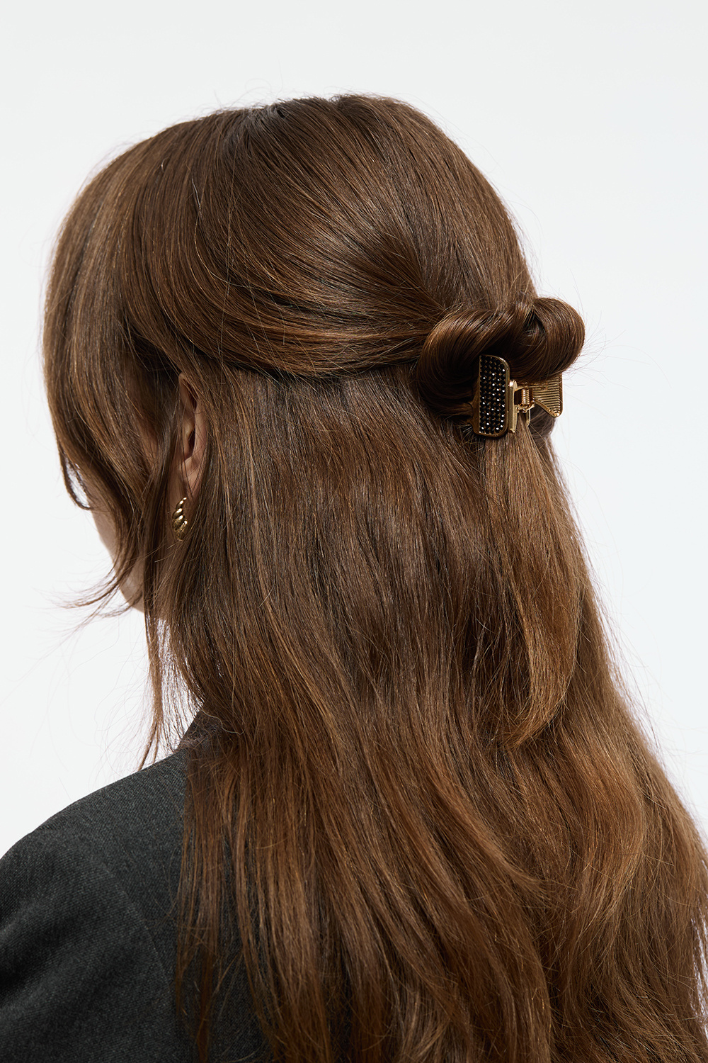 Gullfarget hårklype med svart strass