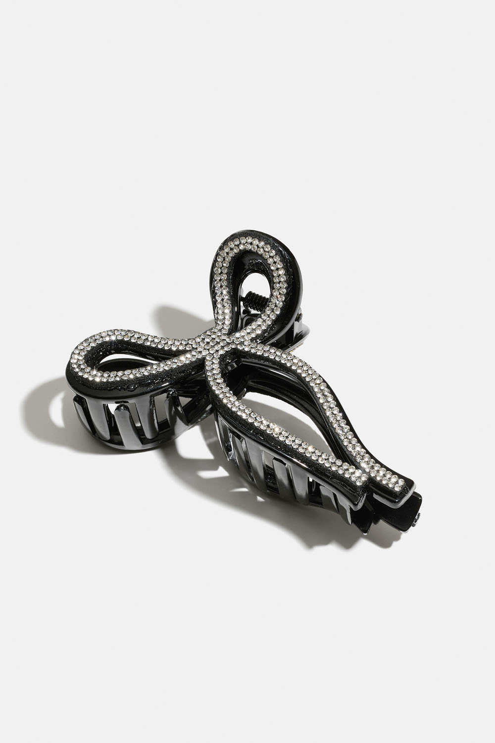 Hårklype i sløyfeform med strass.