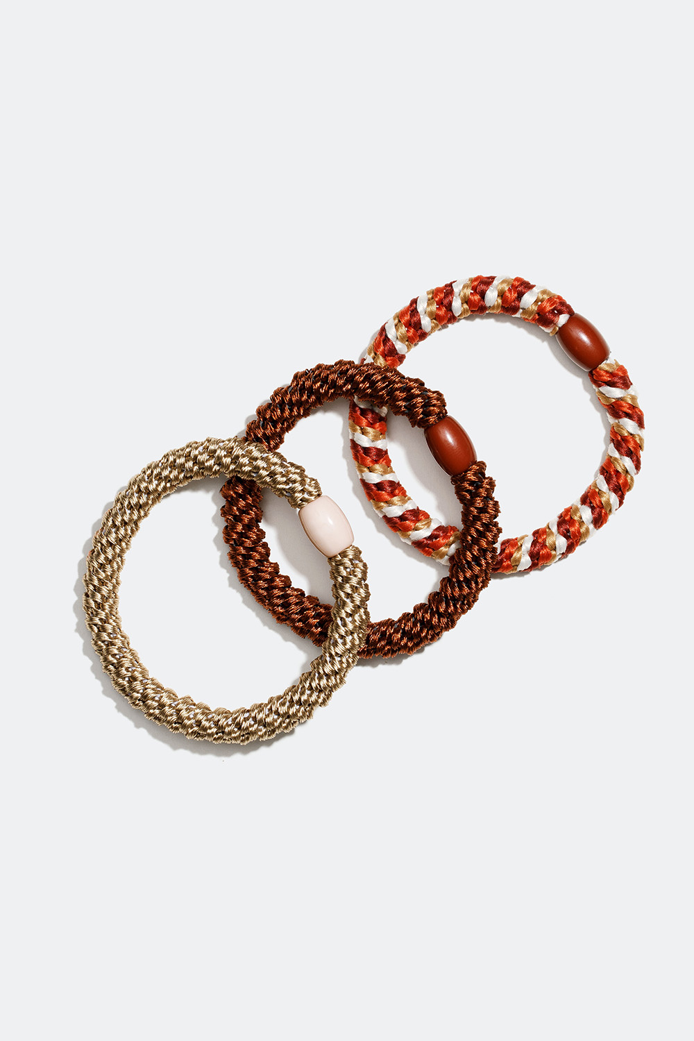 Flettede hårstrikker i brune og beige toner, 3-pakning