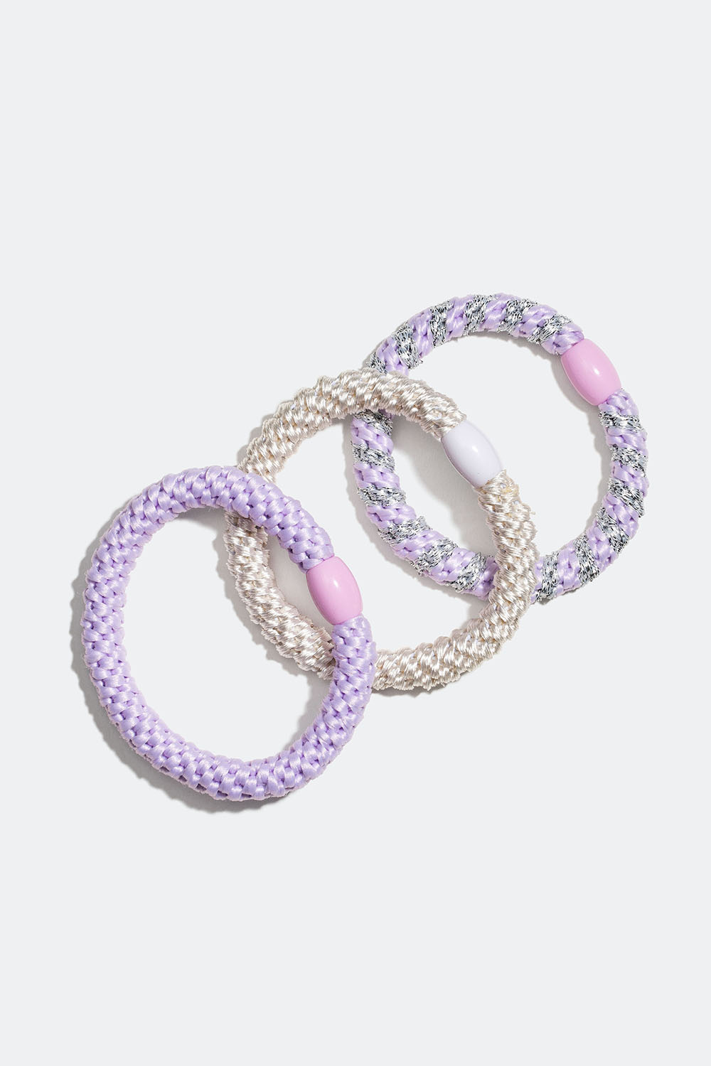 Flettede hårstrikker i lyselilla miks, 3-pakning