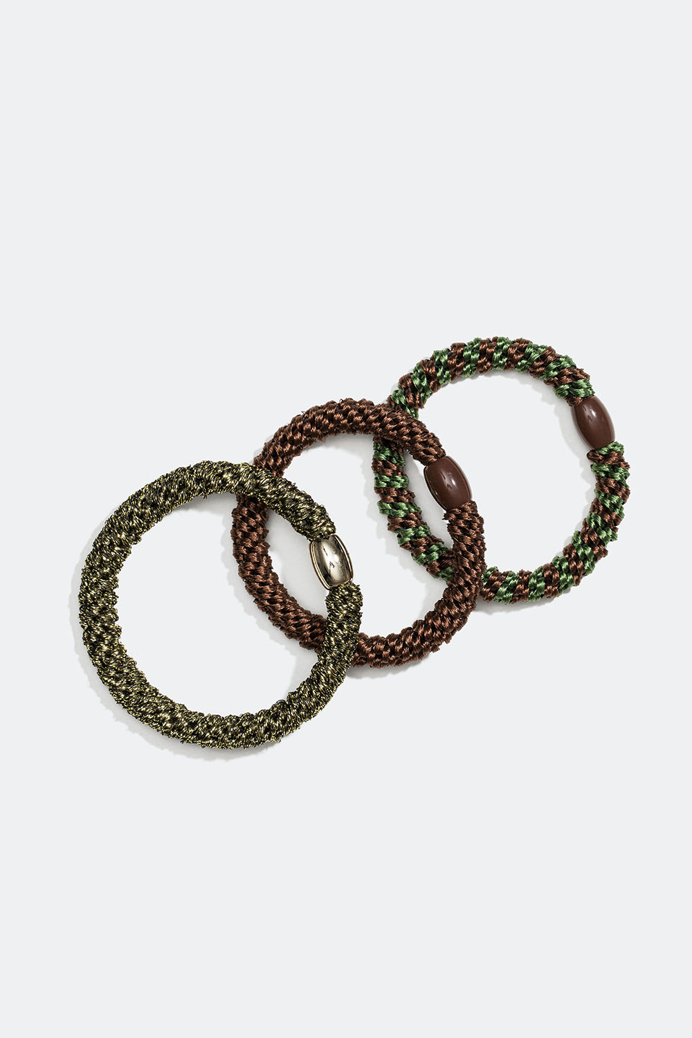 Flettede hårstrikker i grønn og brun miks, 3 pakning