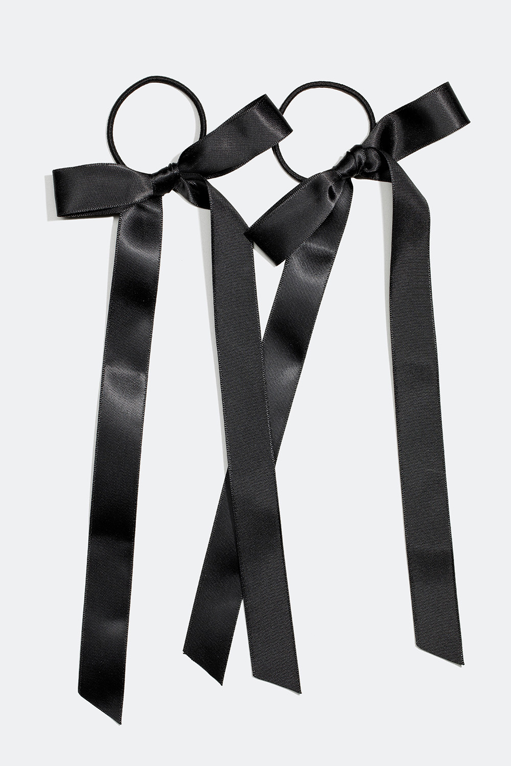 Hårstrikker med svarte rosetter, 2 pakning