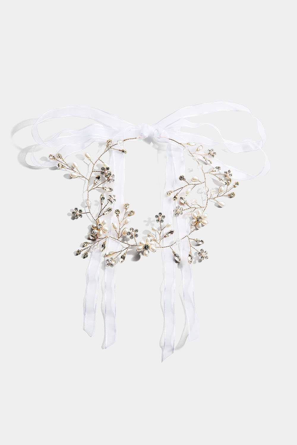 Hårpynt med blomster og perler