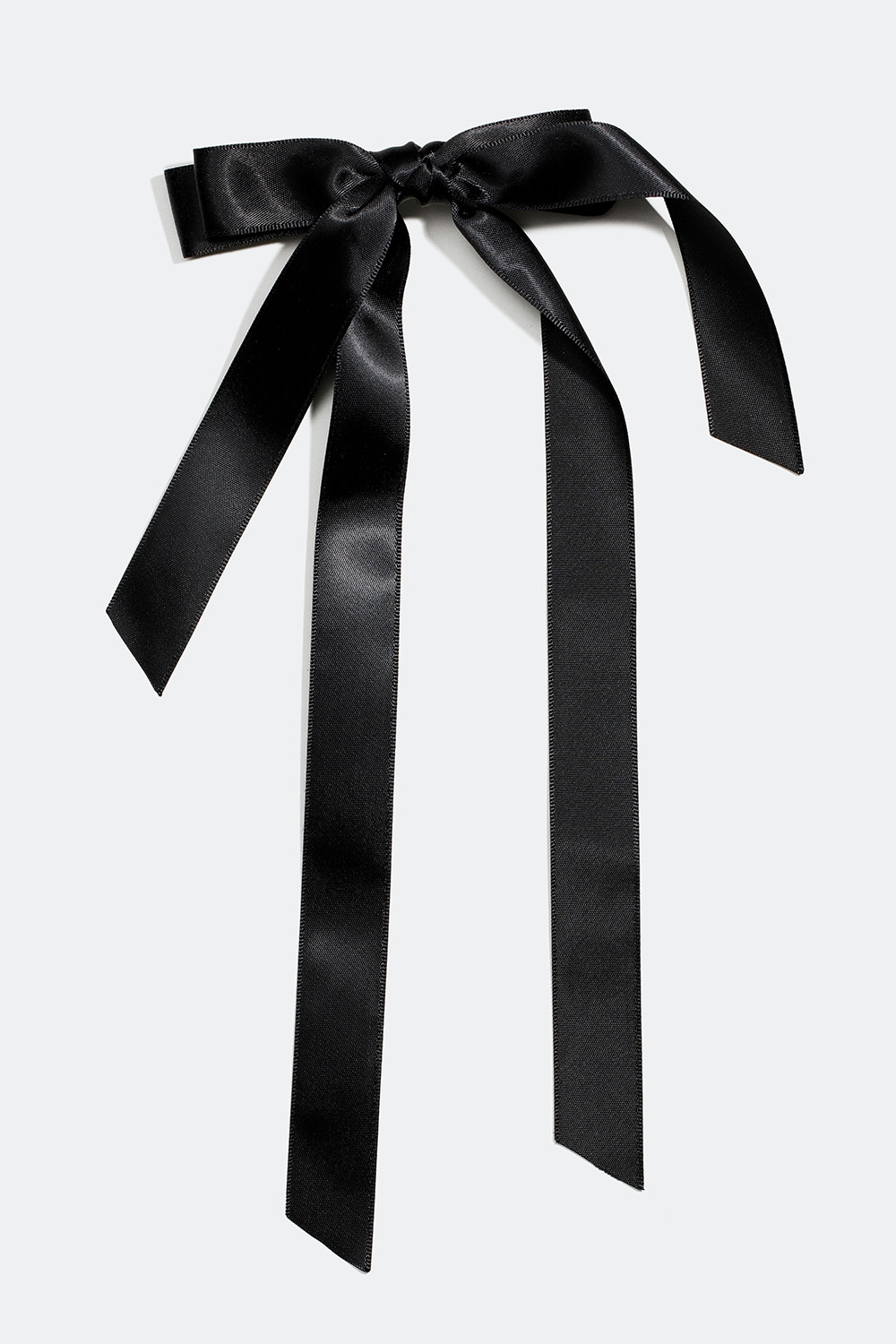 Hårspenne med svart rosett