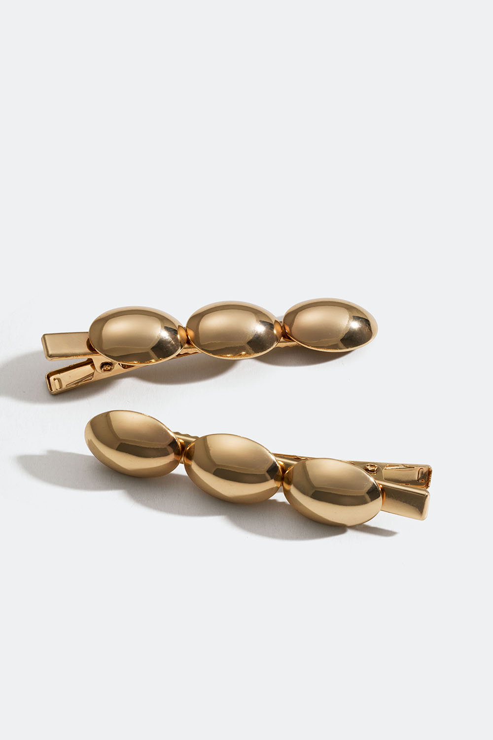 Gullfargede hårspenner med ovale plater, 2 pakning