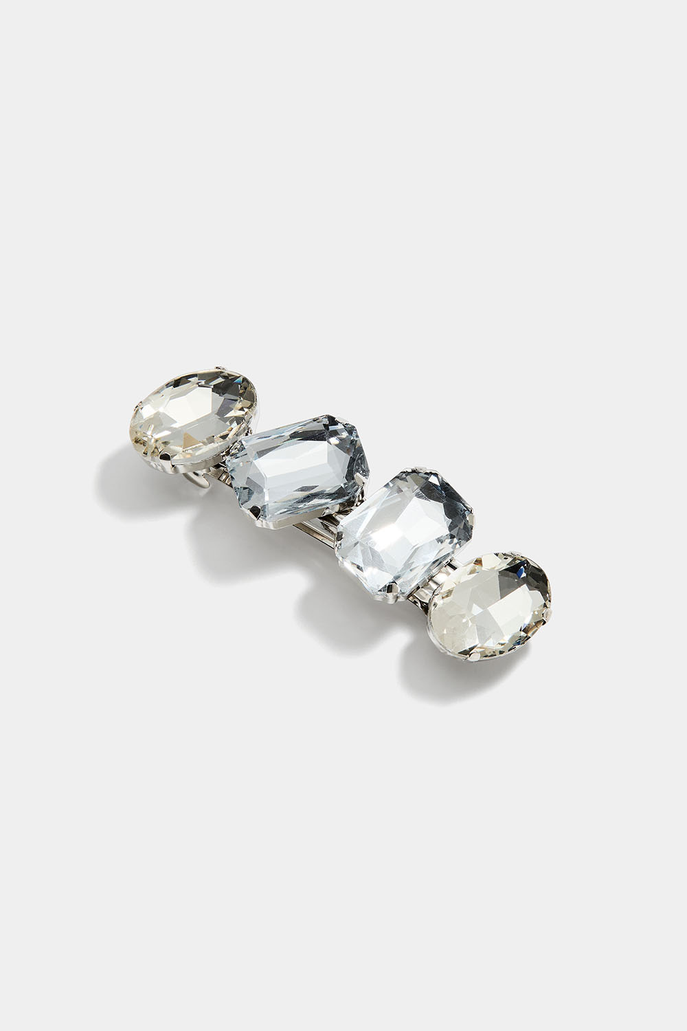 Hårspenne med store, hvite glassteiner