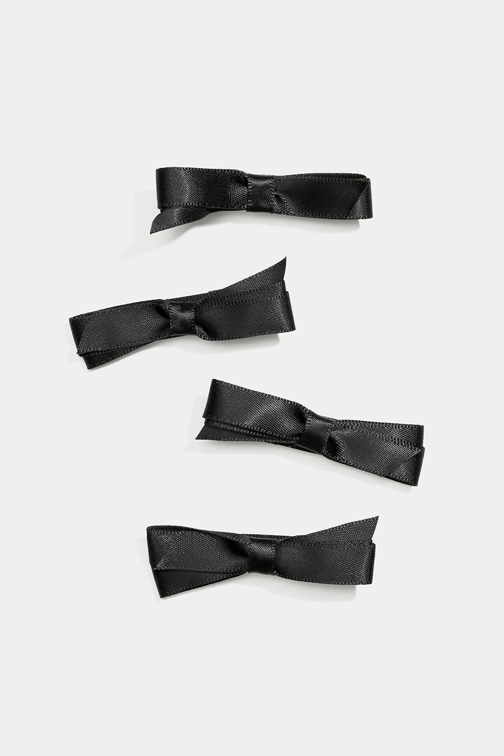 Hårspenner med små, svarte sløyfer, 4-pakning