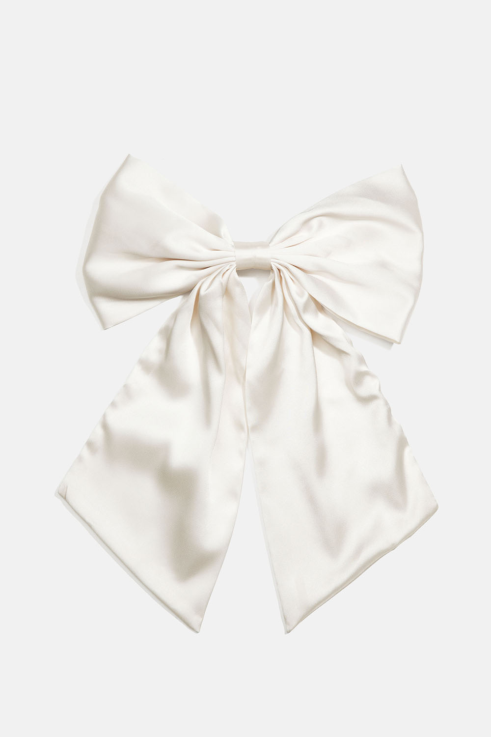 Hårspenne med stor, hvit sløyfe