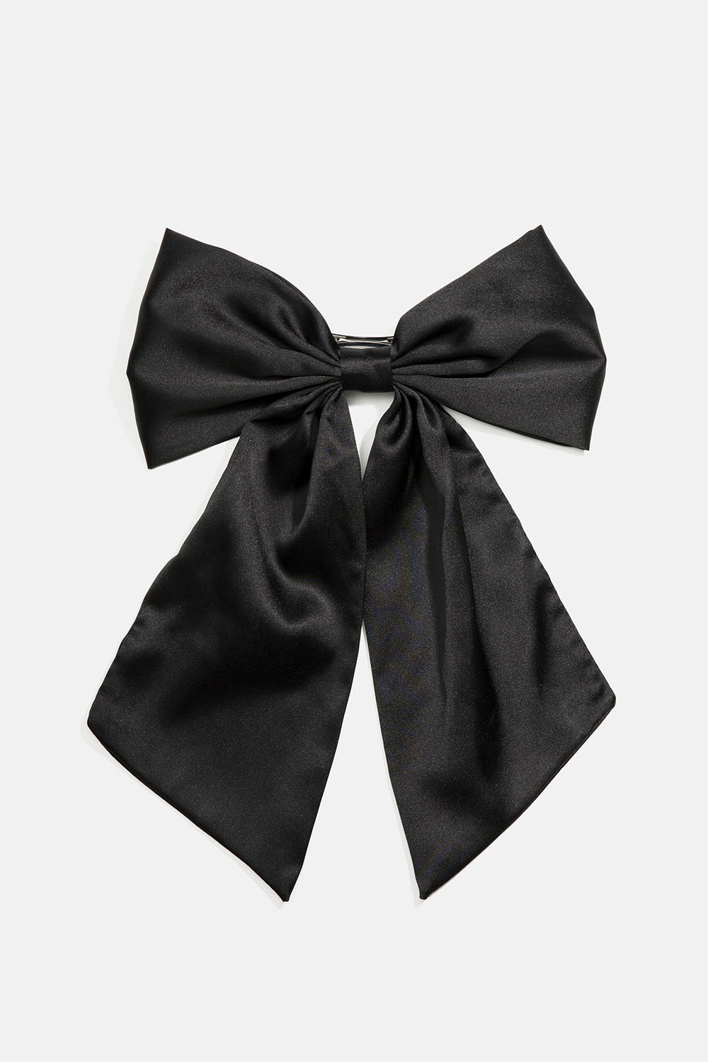 Hårspenne med stor, svart sløyfe