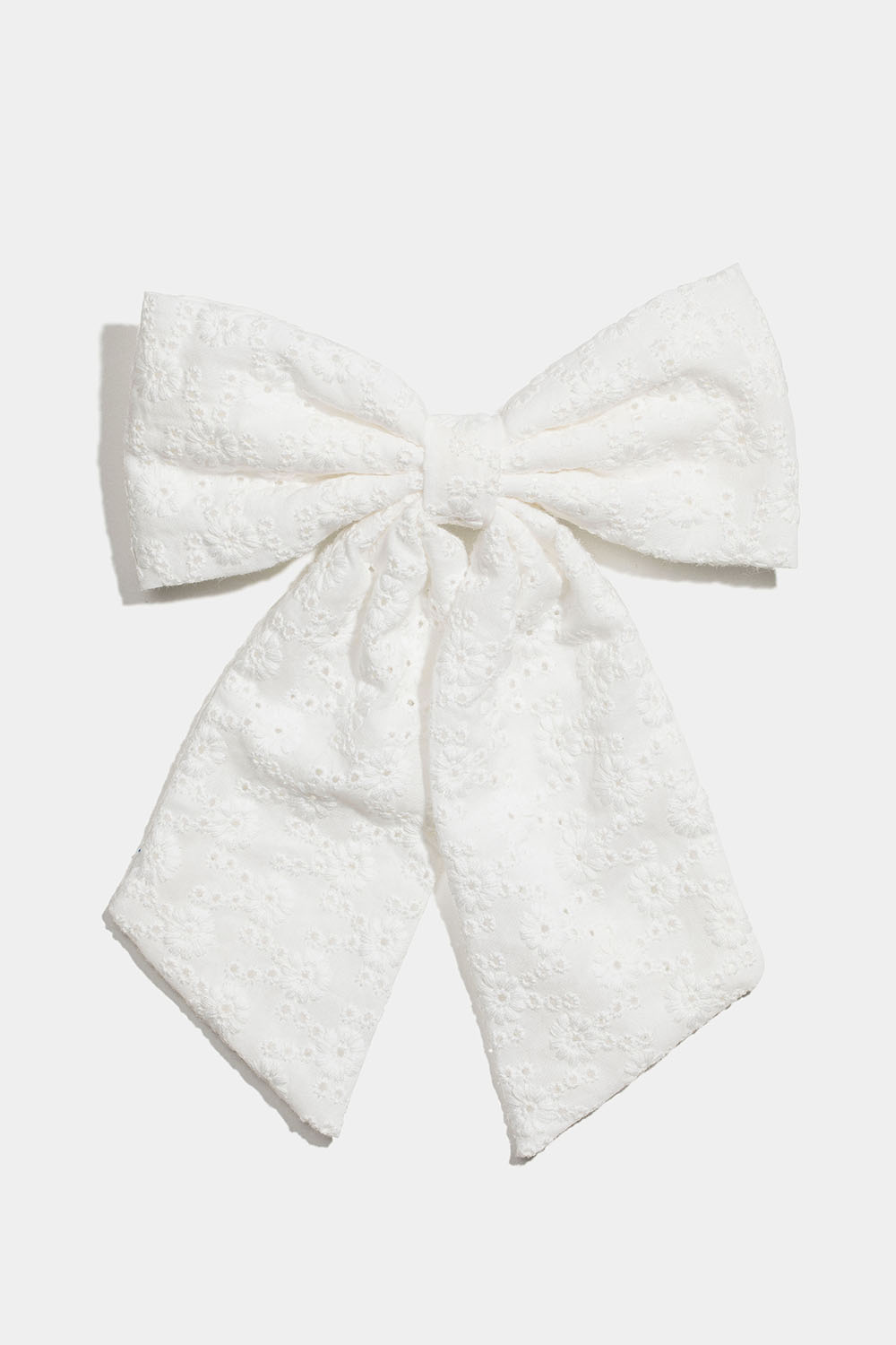 Hårspenne med brodert sløyfe