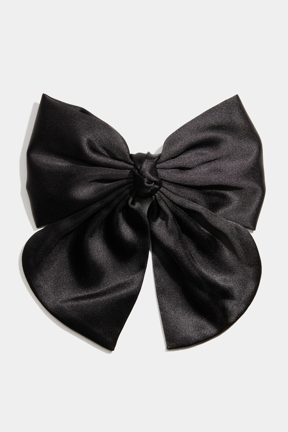 Hårspenne med sort sløyfe og knute