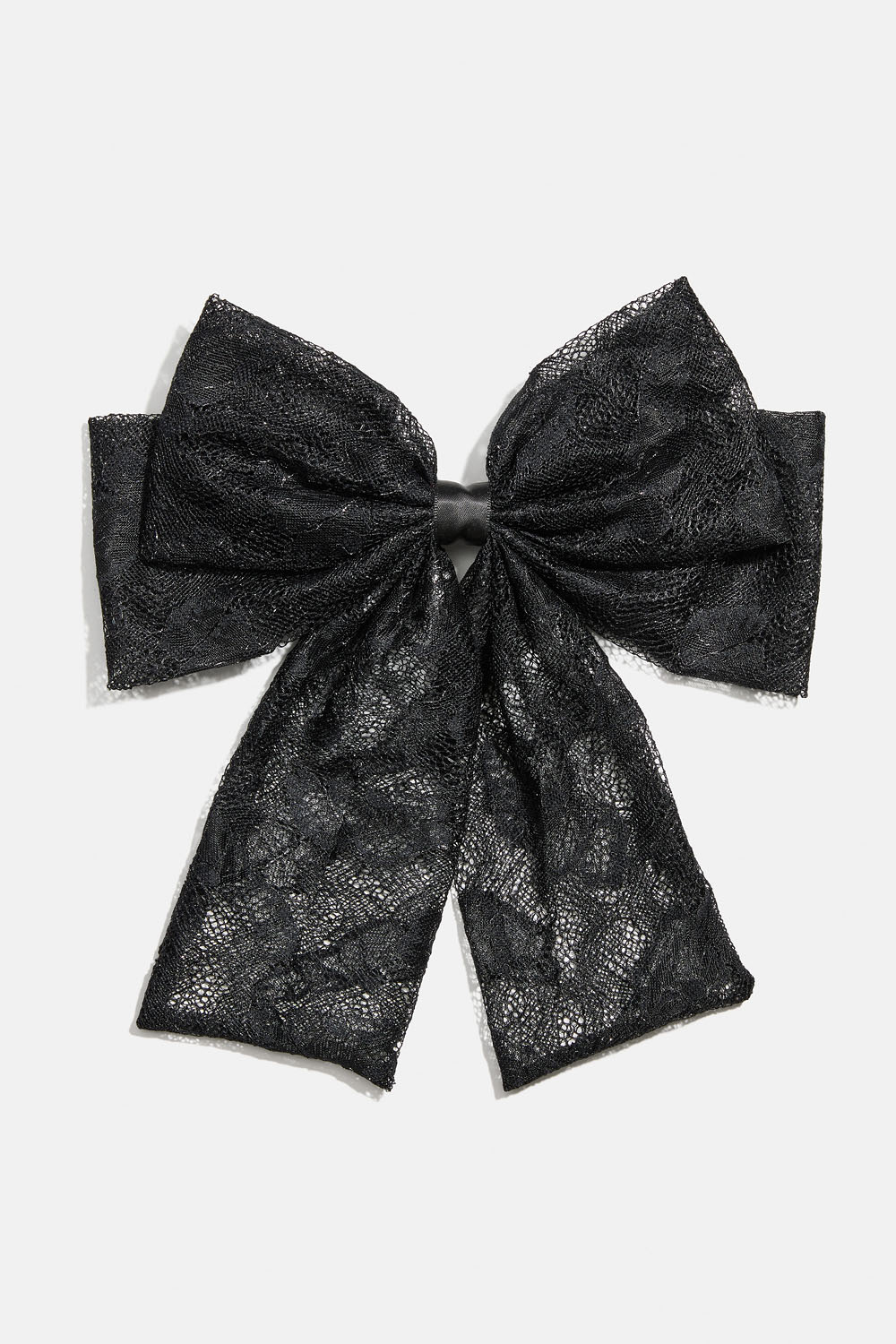 Hårspenne med dobbel blondesløyfe.