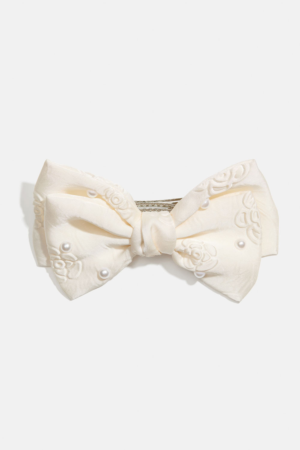 Hårspenne med hvit sløyfe, perler og rosemønster