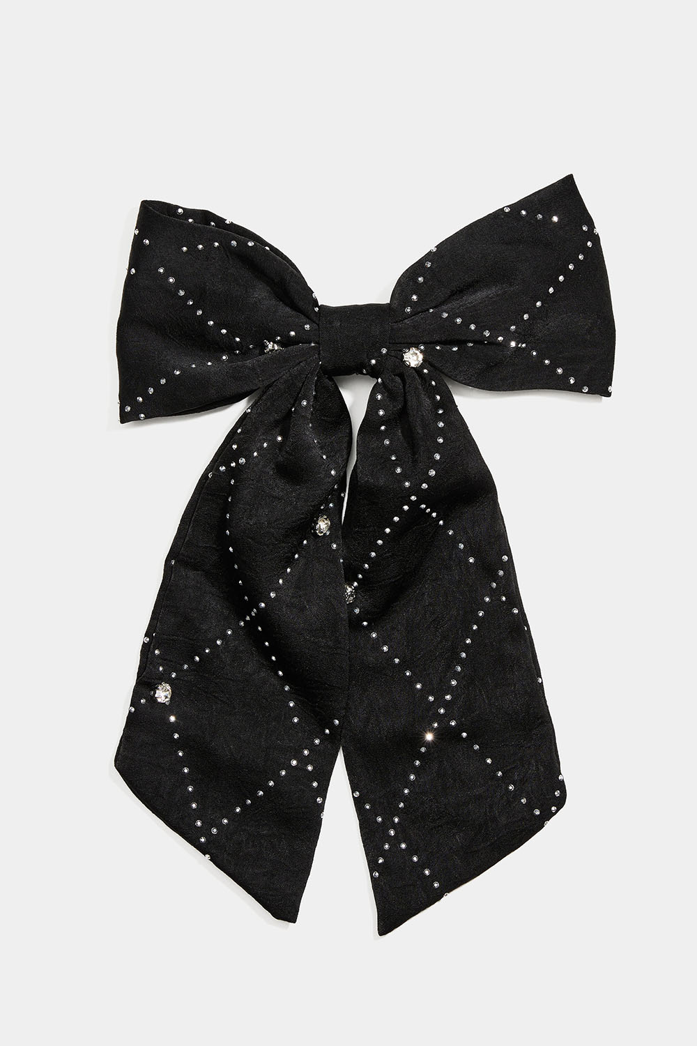 Hårspenne med sort sløyfe, små nagler og steiner