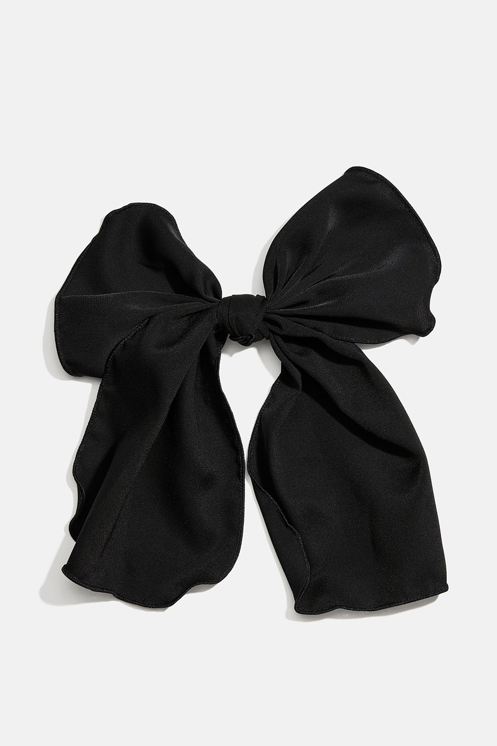 Hårspenne med sløyfe i svart stoff