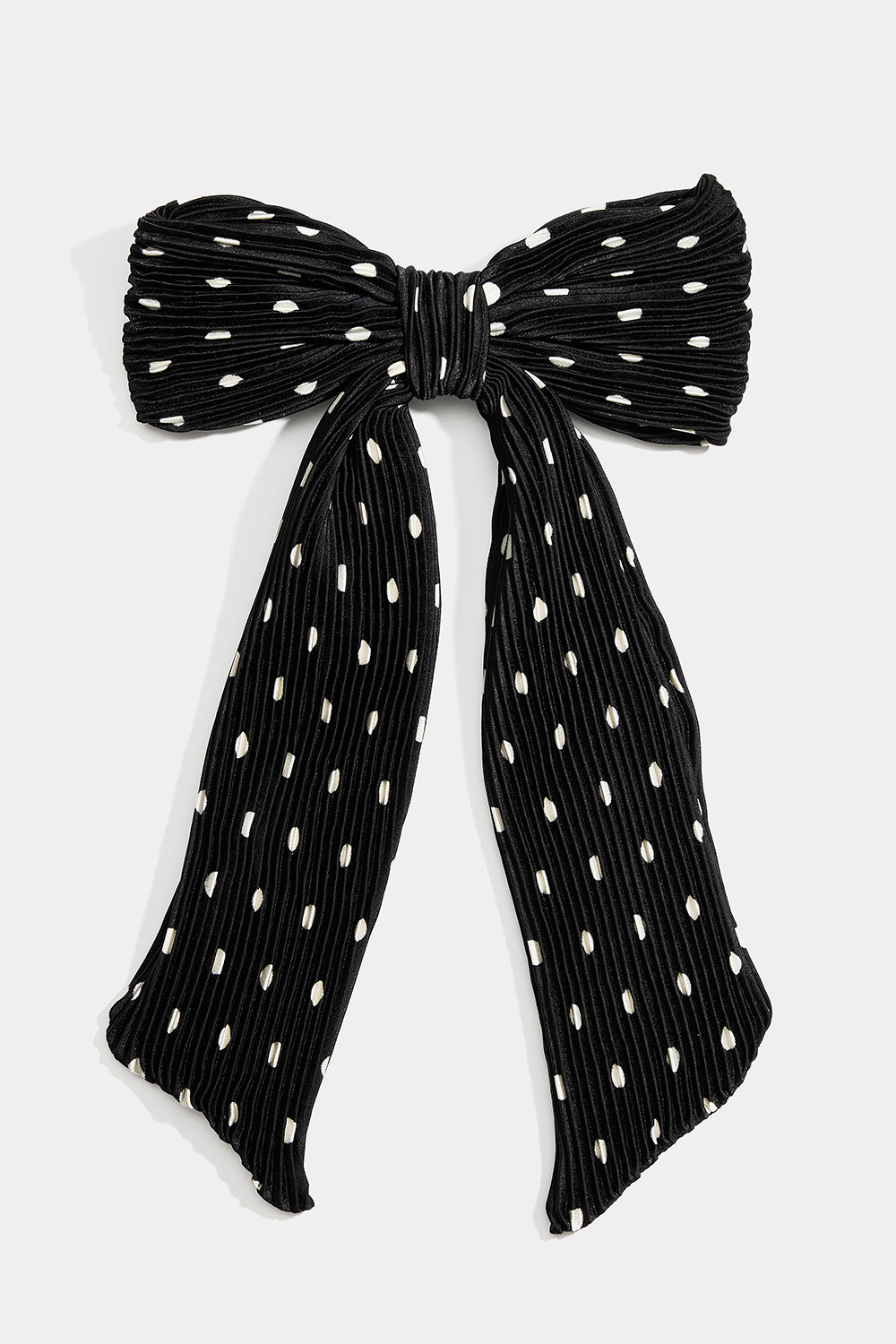 Hårspenne med svart, plissert sløyfe med prikker