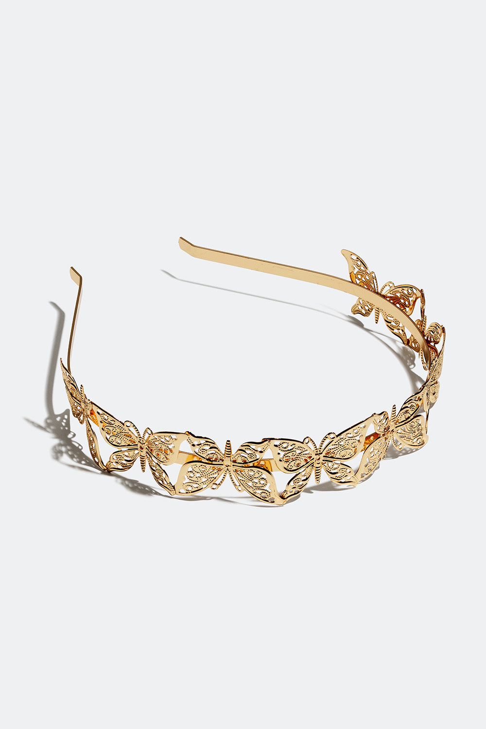 Gullfarget hårbøyle med sommerfugler