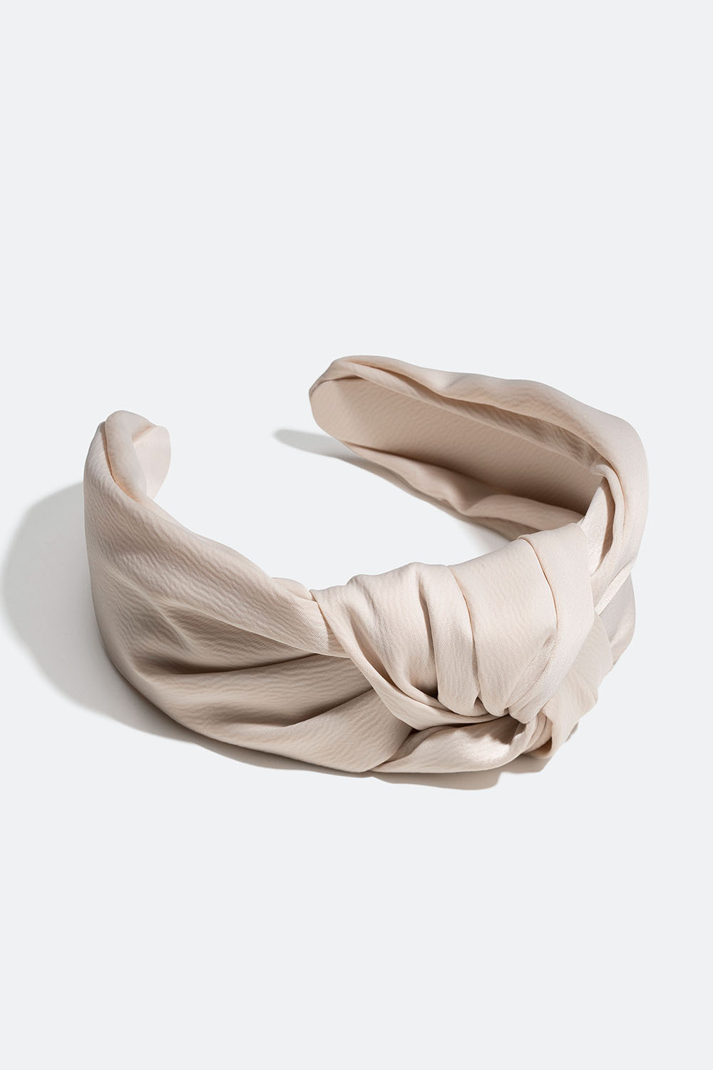 Beige hårbøyle med stor knute