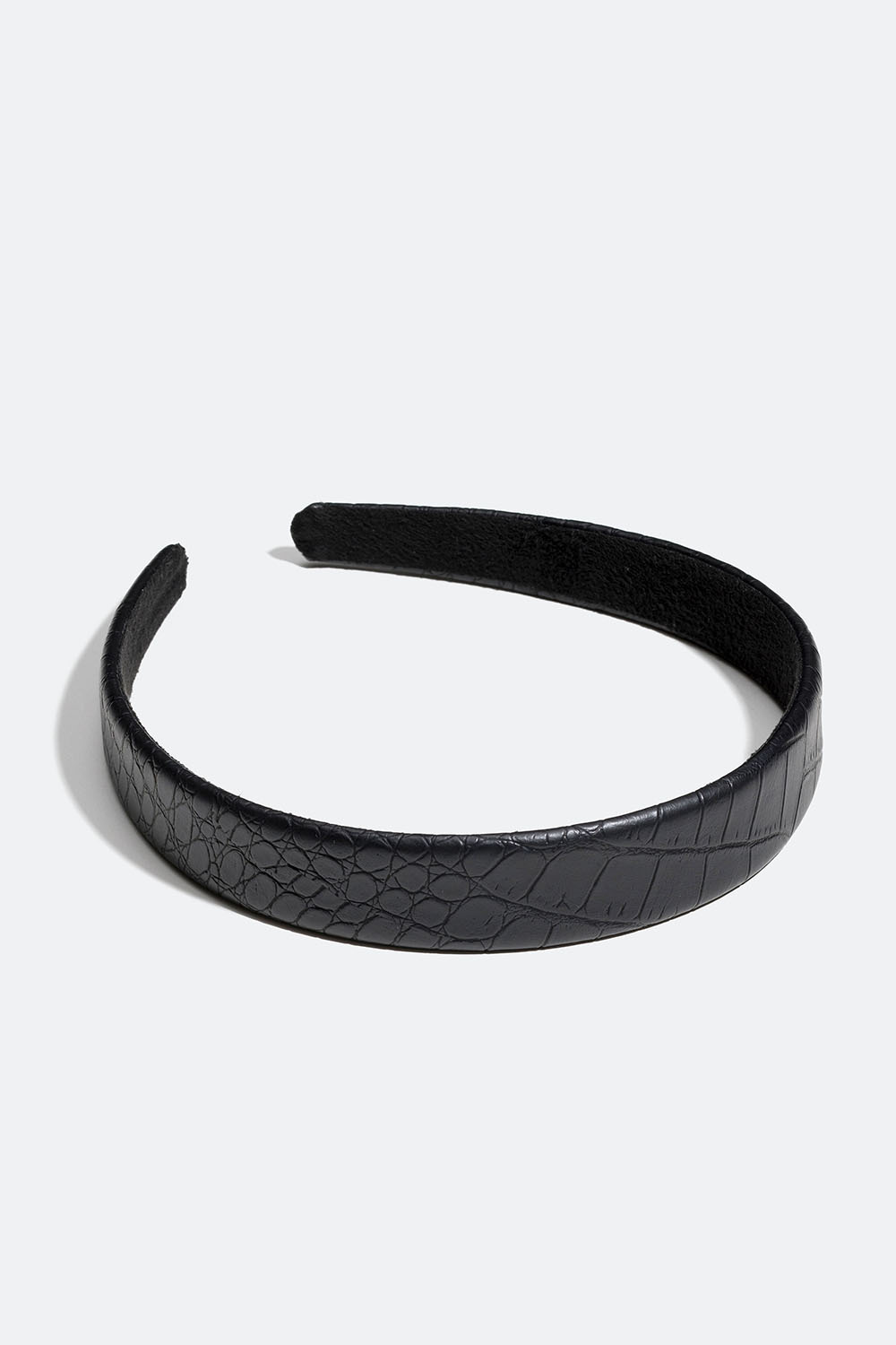 Svart krokodillemønstret hårbøyle