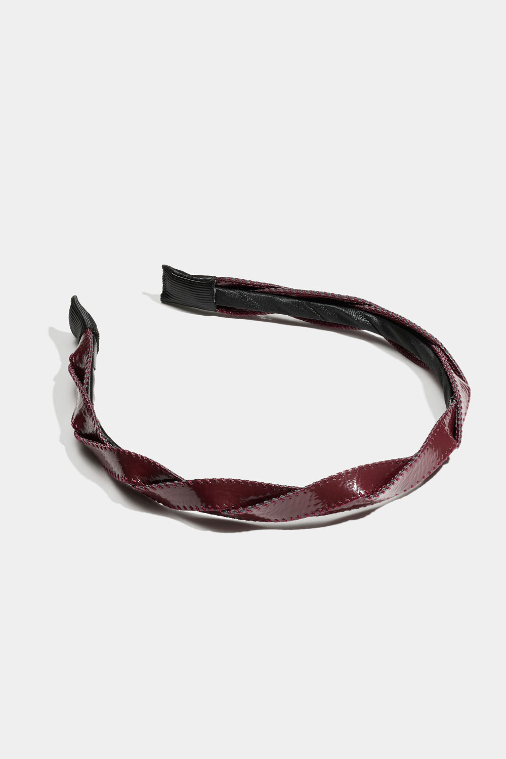 Vinrød hårbøyle med tvunnet bånd